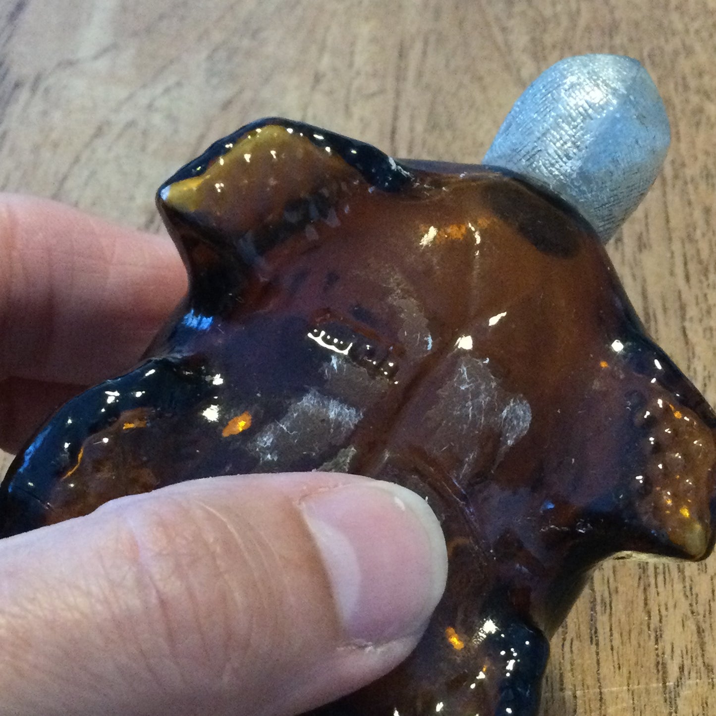 Vintage Avon Tai Winds Turtle shape collectible aftershave bottle. Empty. Retro brown glass.