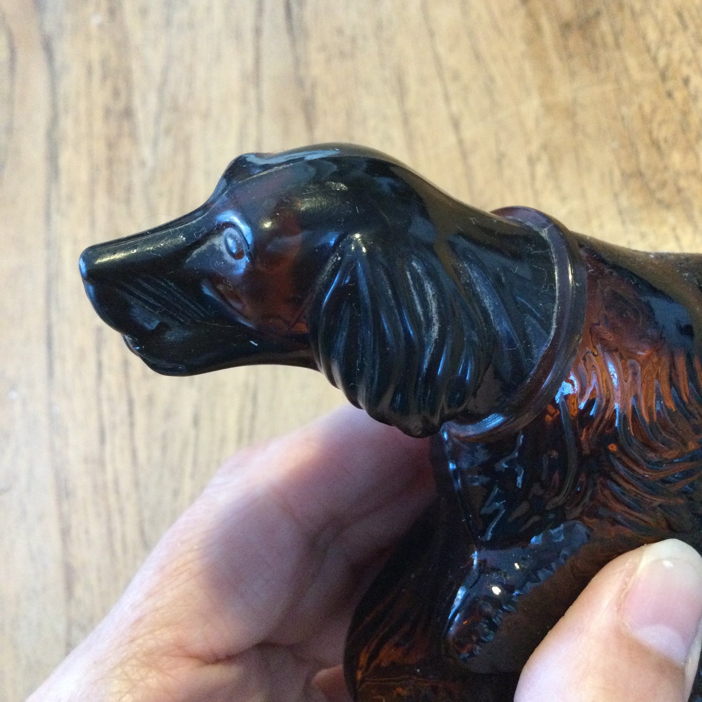Vintage Avon Cosmetics aftershave bottle in amber glass. Pointer dog shape. Men's perfume. Empty. ‘At point’ retriever. Collectible.