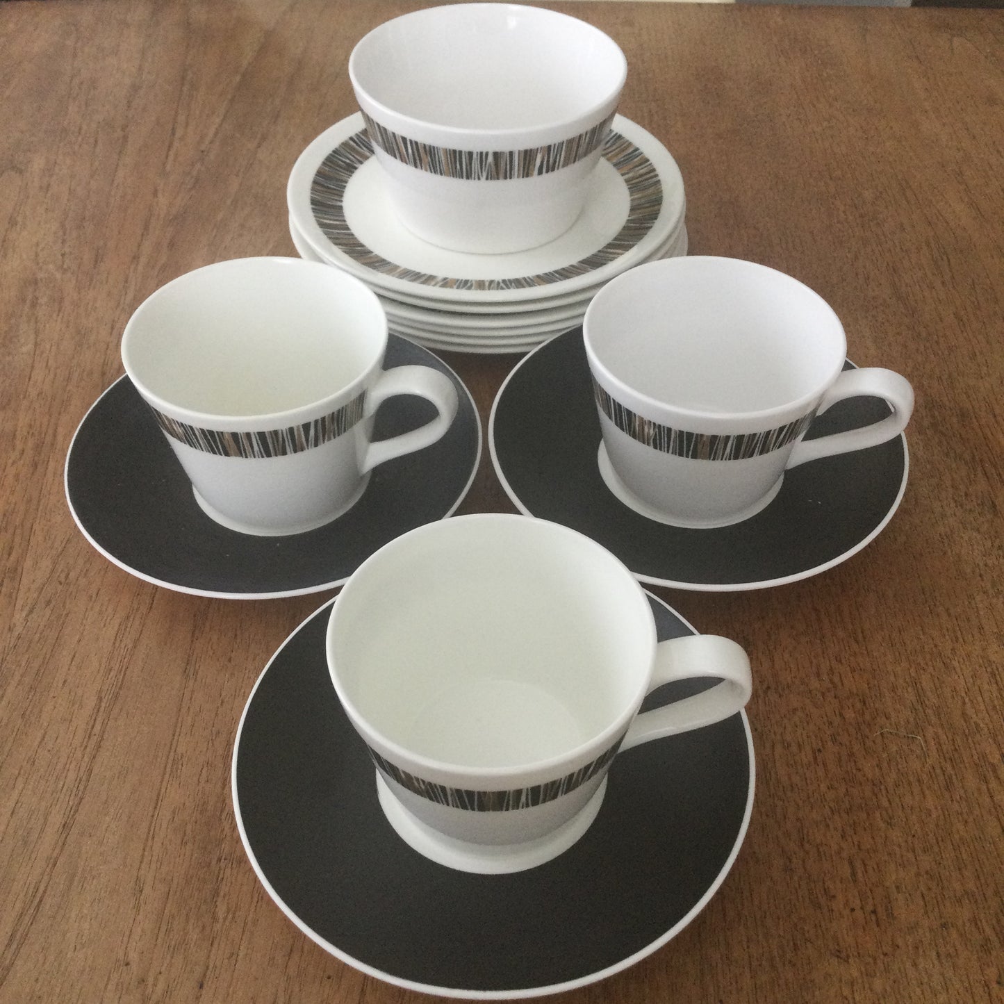 1960s Royal Tuscan Wedgwood Cascade set of 6 side plates. Black and gold retro stripes on white china.