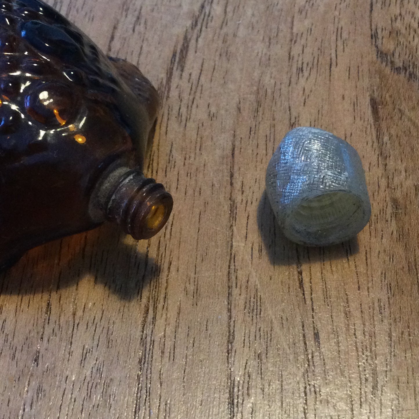 Vintage Avon Tai Winds Turtle shape collectible aftershave bottle. Empty. Retro brown glass.