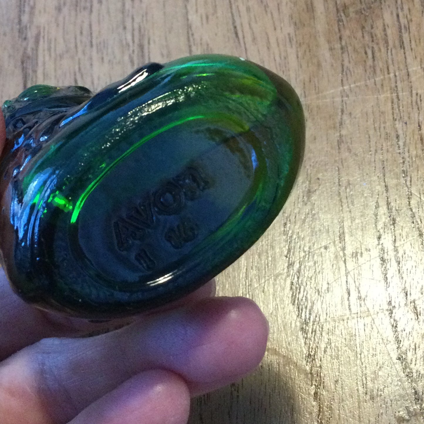 Vintage Avon green glass Christmas stocking Charisma aftershave bottle - full. Retro perfume bottle.