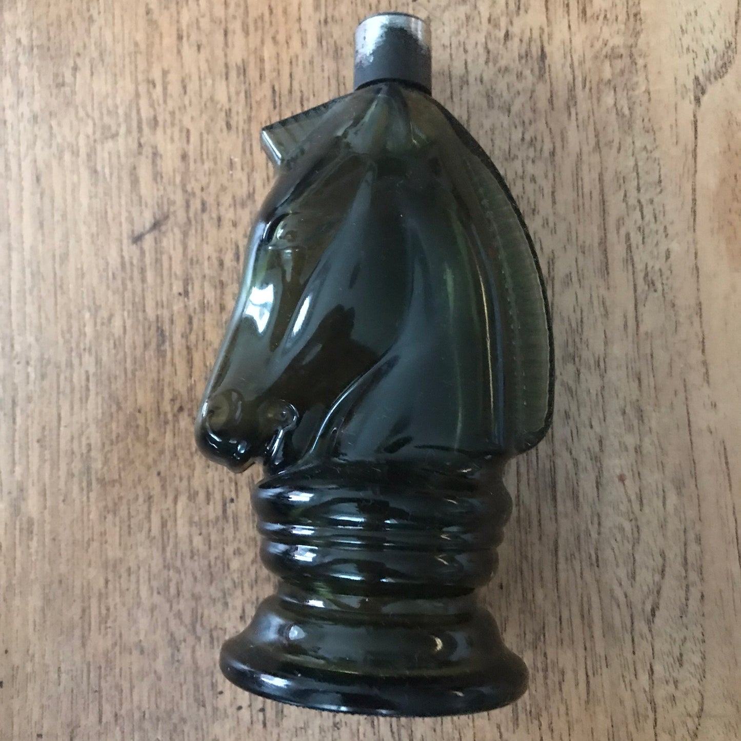 Copy of Avon Cosmetics horse head Bravado aftershave glass bottle Green glass vintage 1970s empty and missing a metal ring