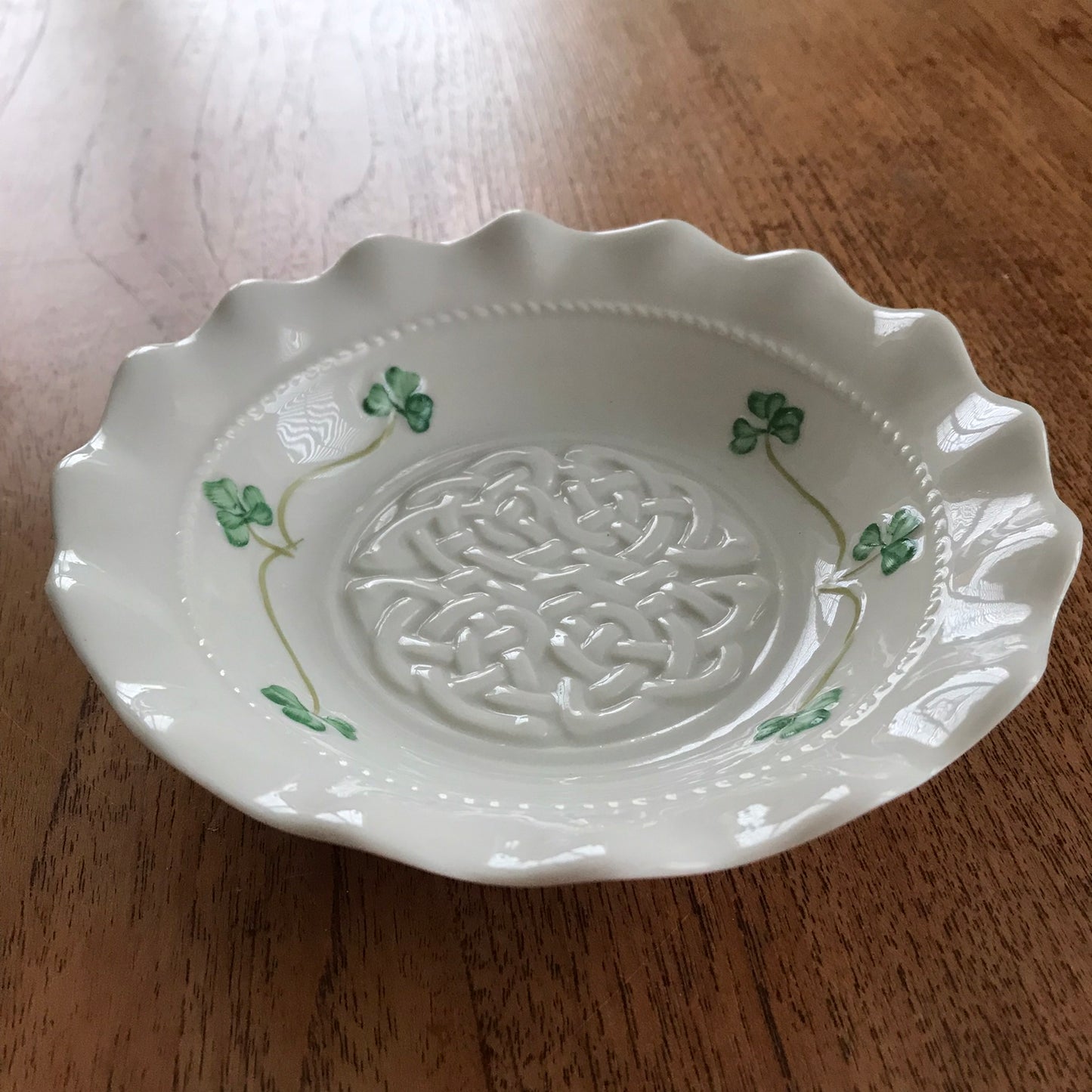 Beautiful Belleek accent dish in the Tara design. Cream china with green shamrock, and raised Celtic Knot design