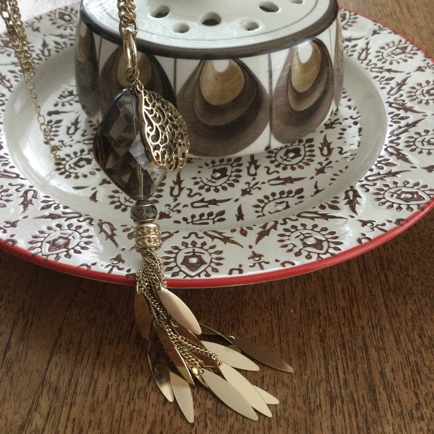 M&S Statement Necklace. Long 28". Dangling pendant gold tone with smokey quartz colour large glass bead. Boho feel