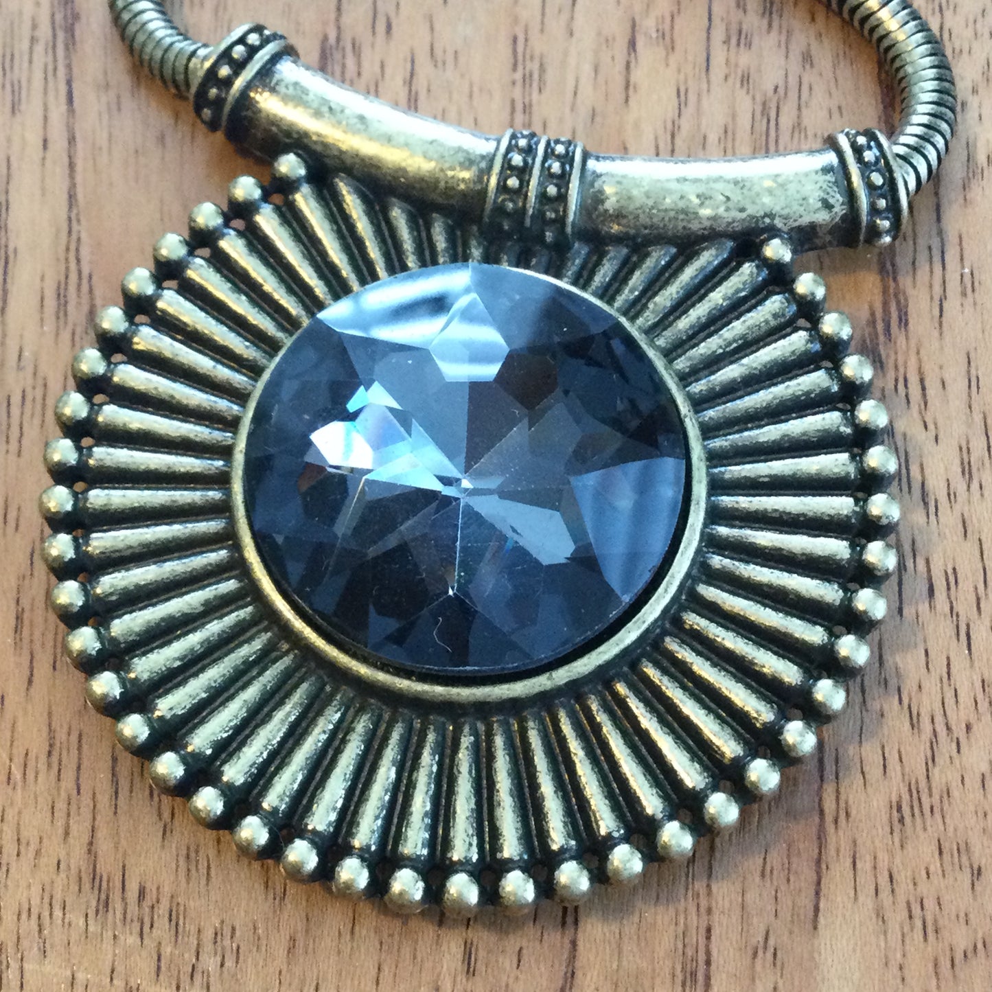 Per Una Antique Gold / Brass Tone Statement Necklace. Medallion shape pendant with grey crystal stone.Bold Design