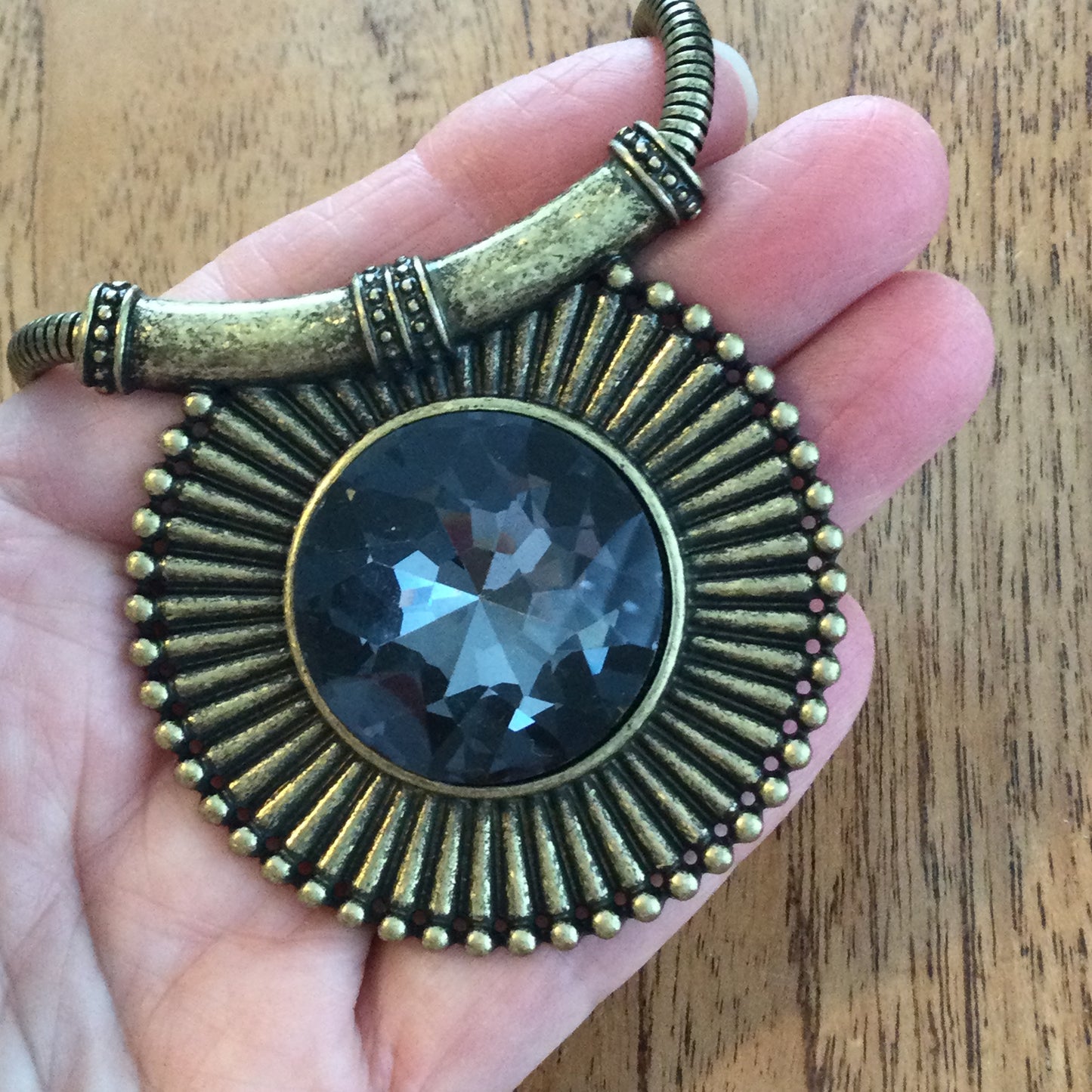Per Una Antique Gold / Brass Tone Statement Necklace. Medallion shape pendant with grey crystal stone.Bold Design