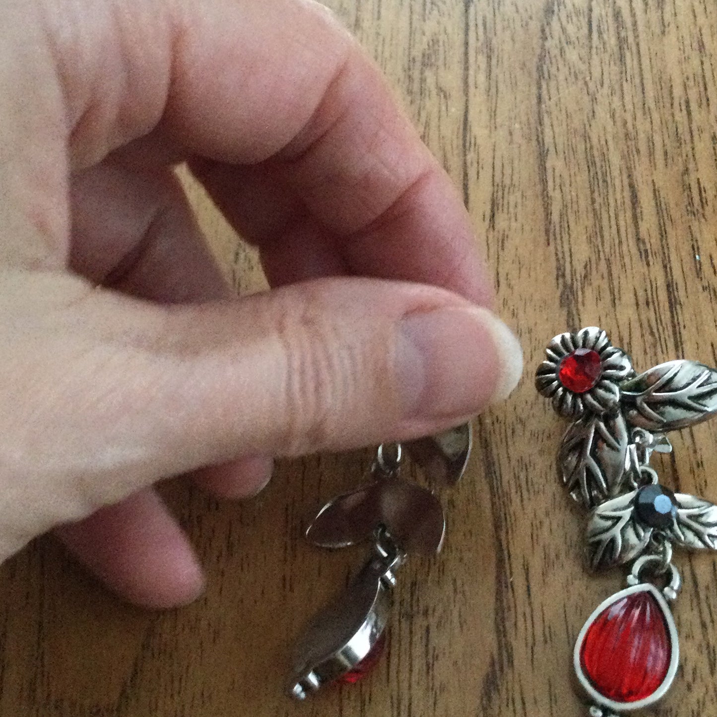 Statement Clip On Dangly Earrings. Silver Coloured With Red Stones. Party. Flower & Leaf Design