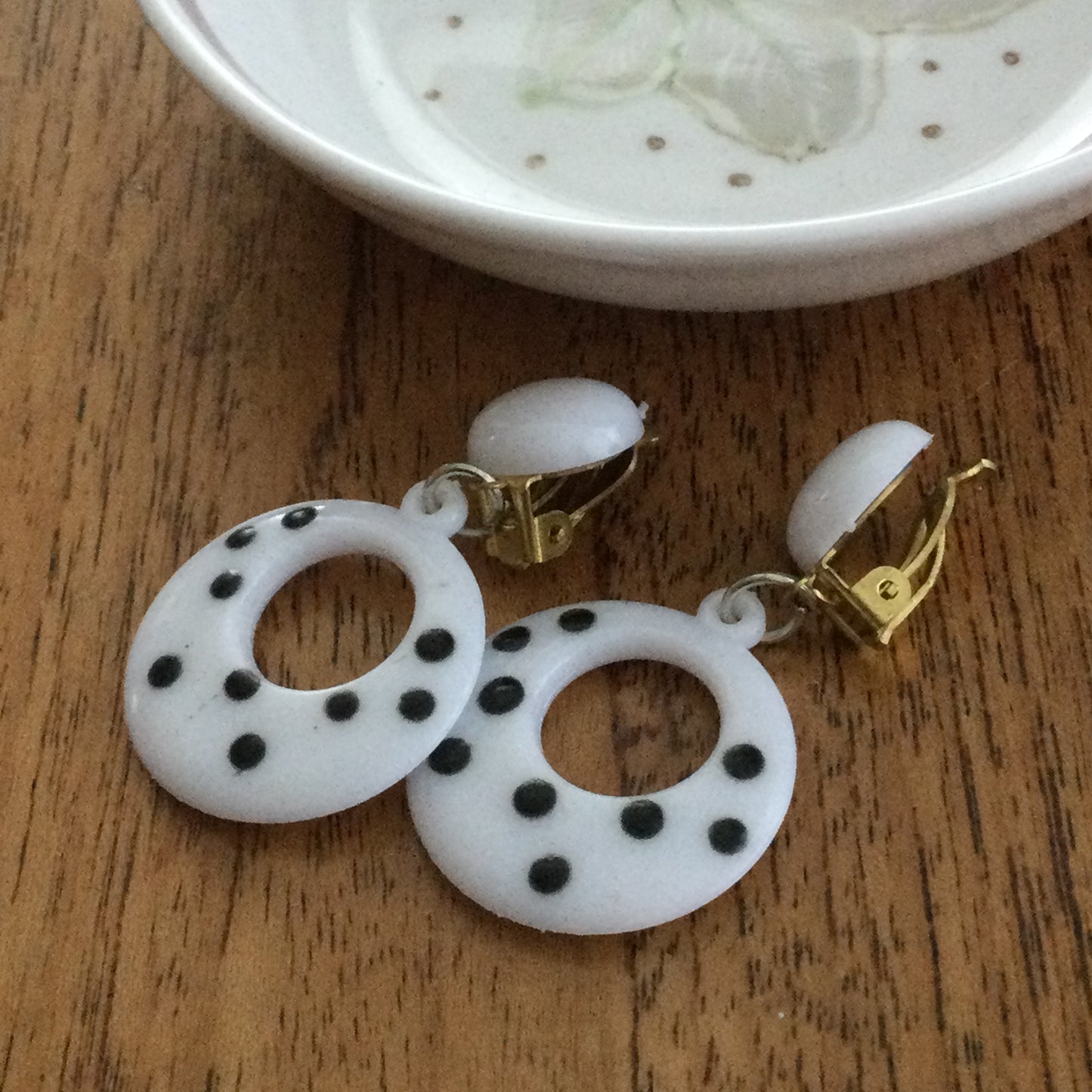 Clip On White Plastic Dangly Retro Earrings. Simple Retro Look 60s 80s. Black spots. Spotty. Hoop Shape