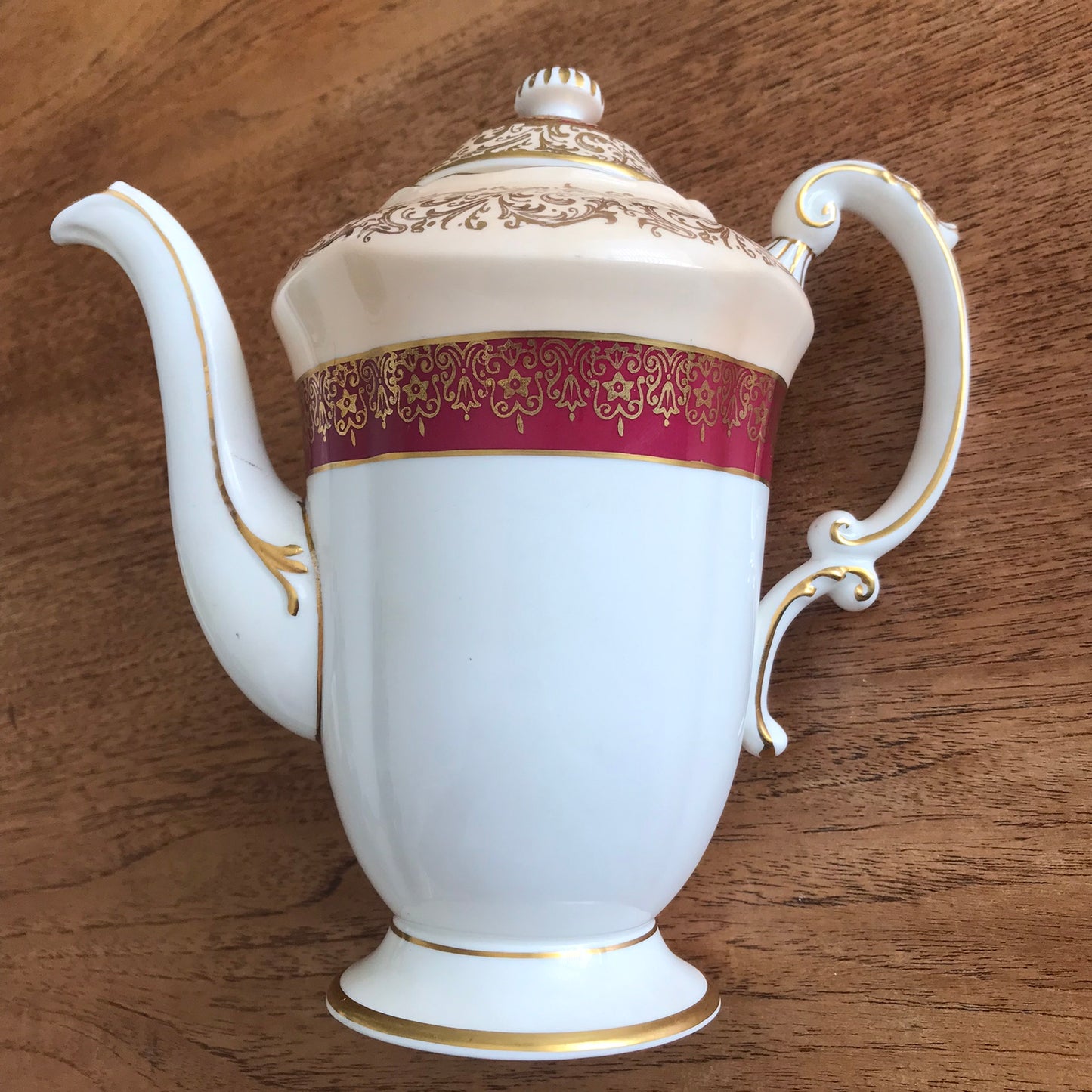 Vintage Paragon coffee pot. White, cream, burgundy and gold. Ornate design. Fancy handle and spout.