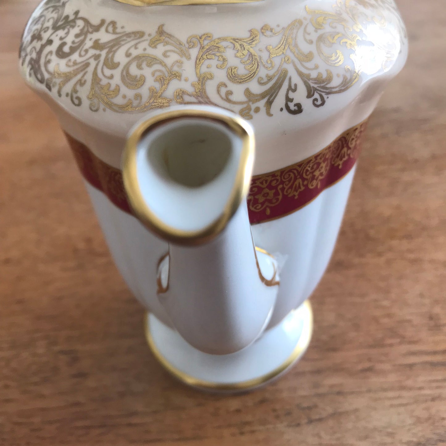 Vintage Paragon coffee pot. White, cream, burgundy and gold. Ornate design. Fancy handle and spout.