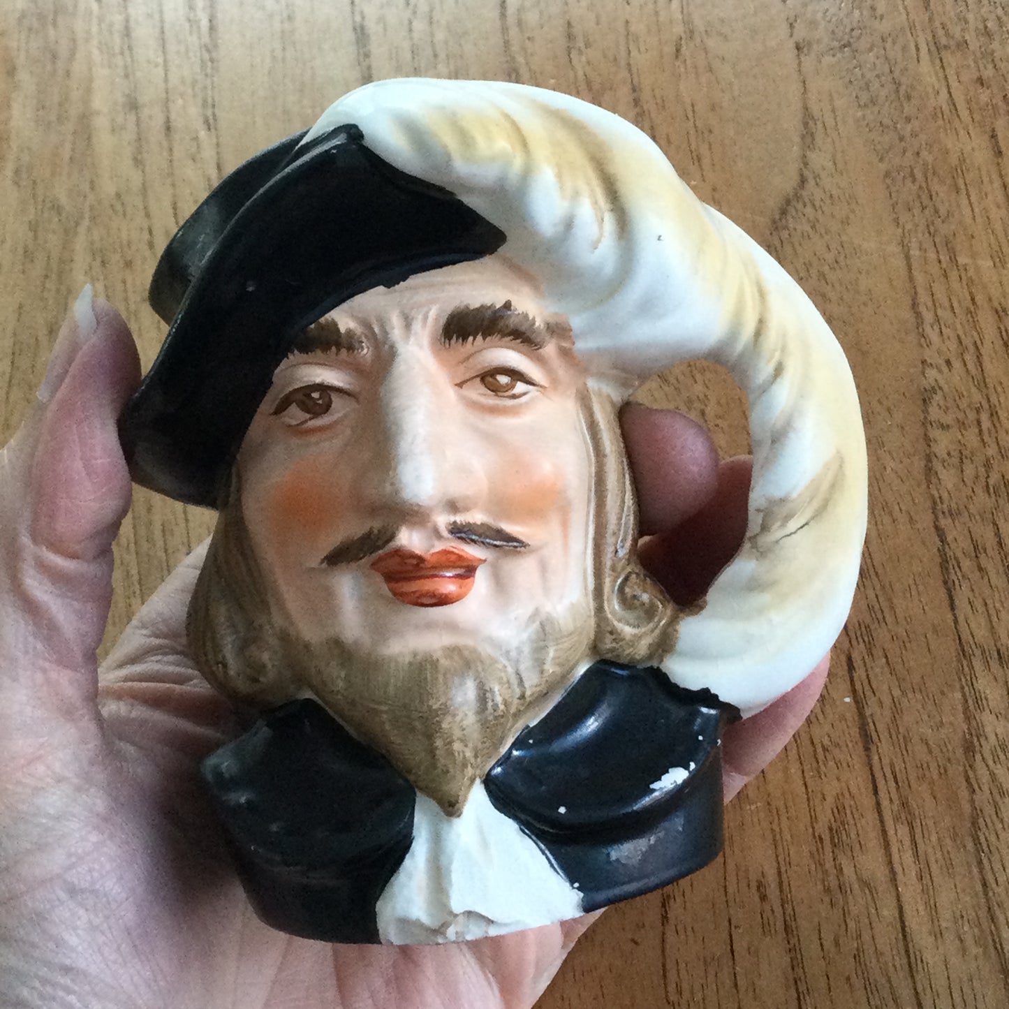 Vintage Shakespeare character / toby mug. Plume is the handle. Black and white. Some damage.