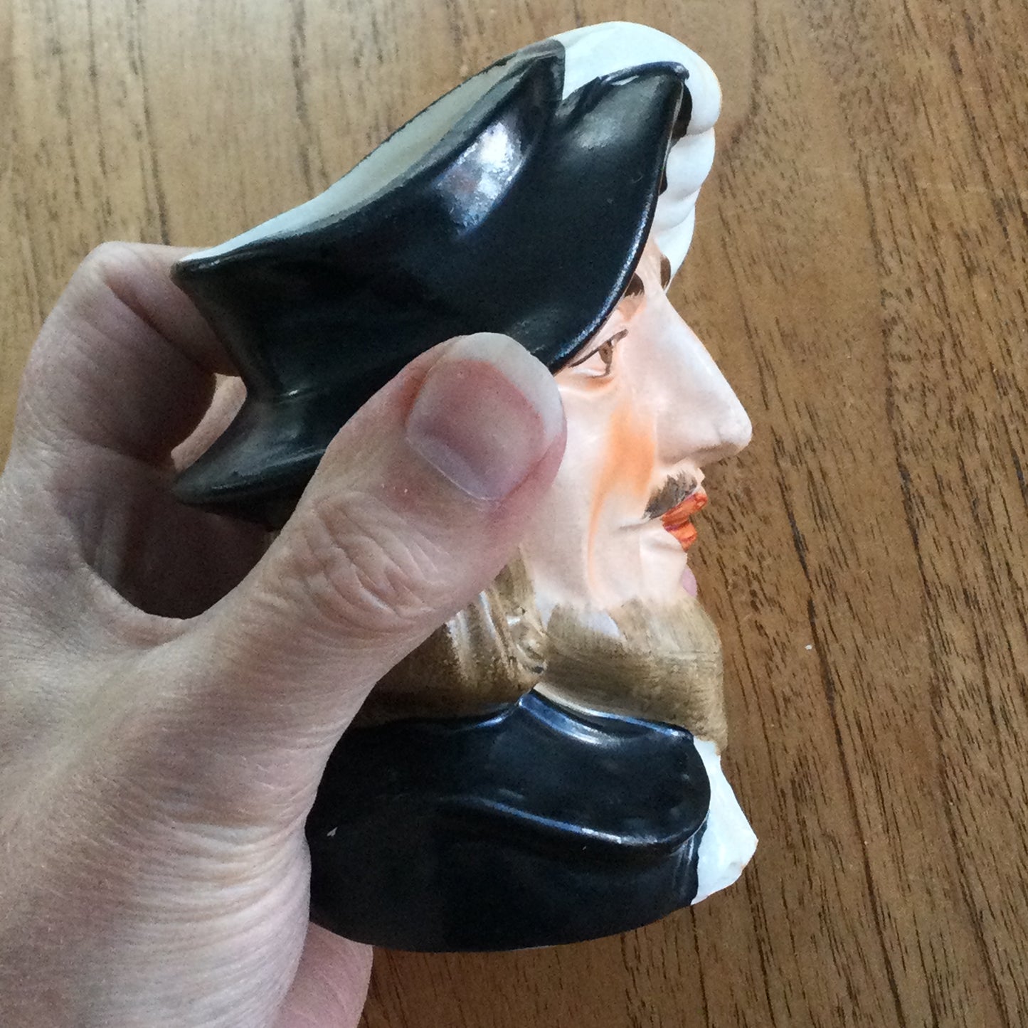 Vintage Shakespeare character / toby mug. Plume is the handle. Black and white. Some damage.