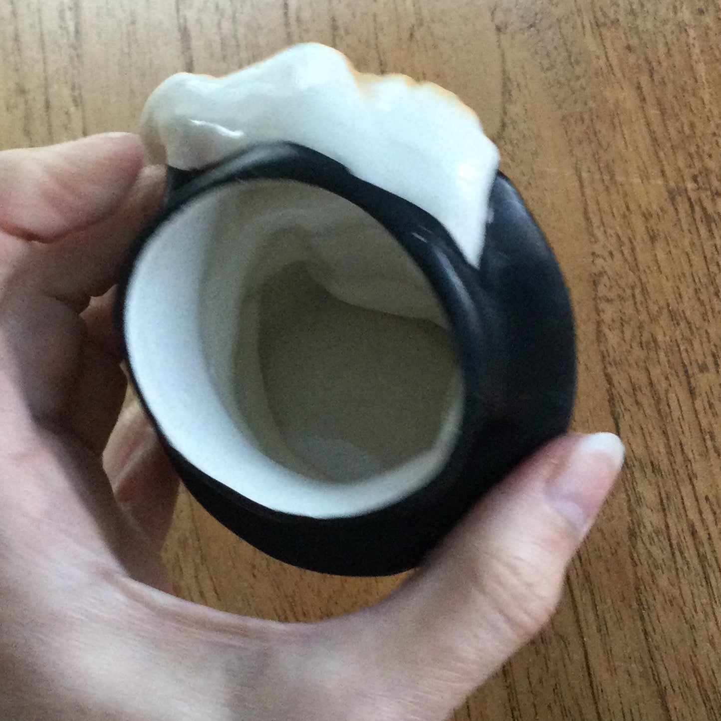 Vintage Shakespeare character / toby mug. Plume is the handle. Black and white. Some damage.