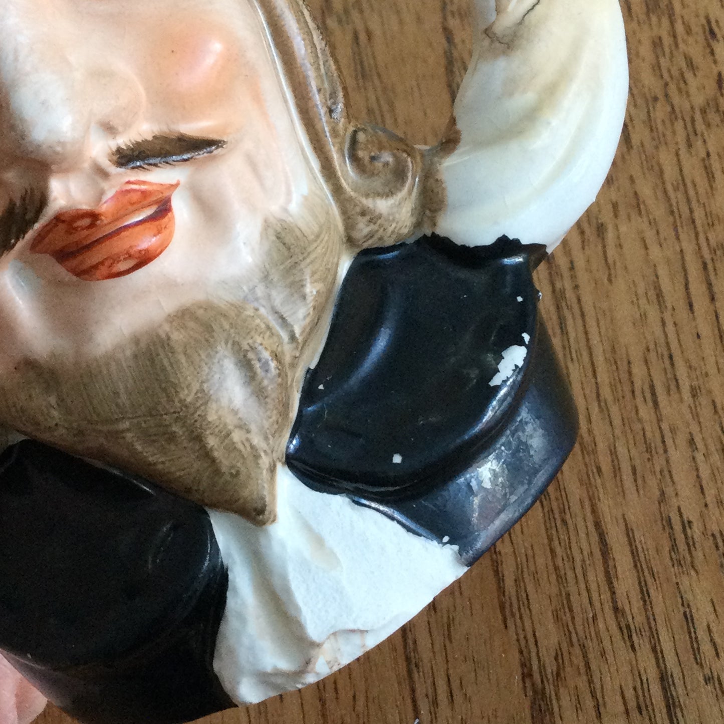 Vintage Shakespeare character / toby mug. Plume is the handle. Black and white. Some damage.