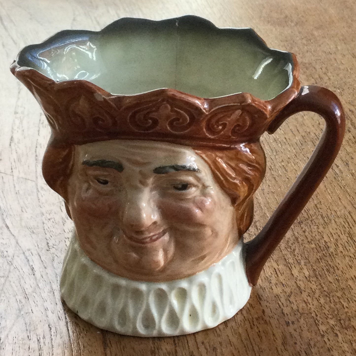 Royal Doulton Small Character / Toby Jug. Old King Cole. Harry Fenton design. Some damage.