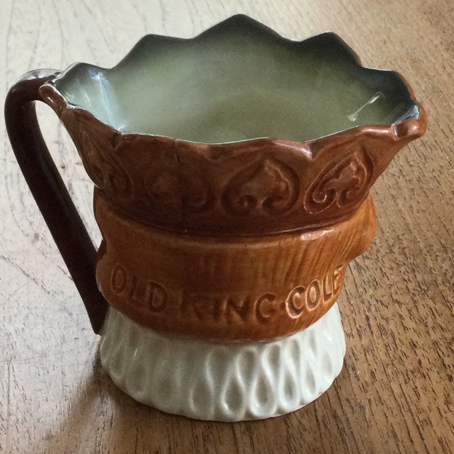 Royal Doulton Small Character / Toby Jug. Old King Cole. Harry Fenton design. Some damage.