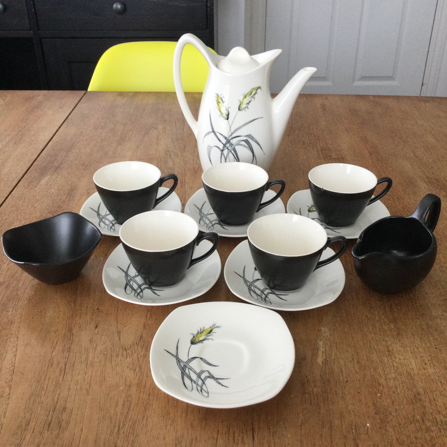 Set of 5 demitasse coffee cups and saucers. Midwinter Bali Hai grasses design by John Russell.