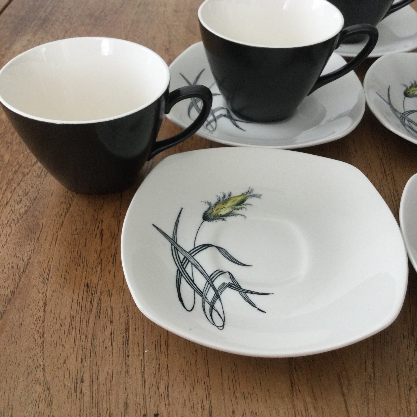 Set of 5 demitasse coffee cups and saucers. Midwinter Bali Hai grasses design by John Russell.