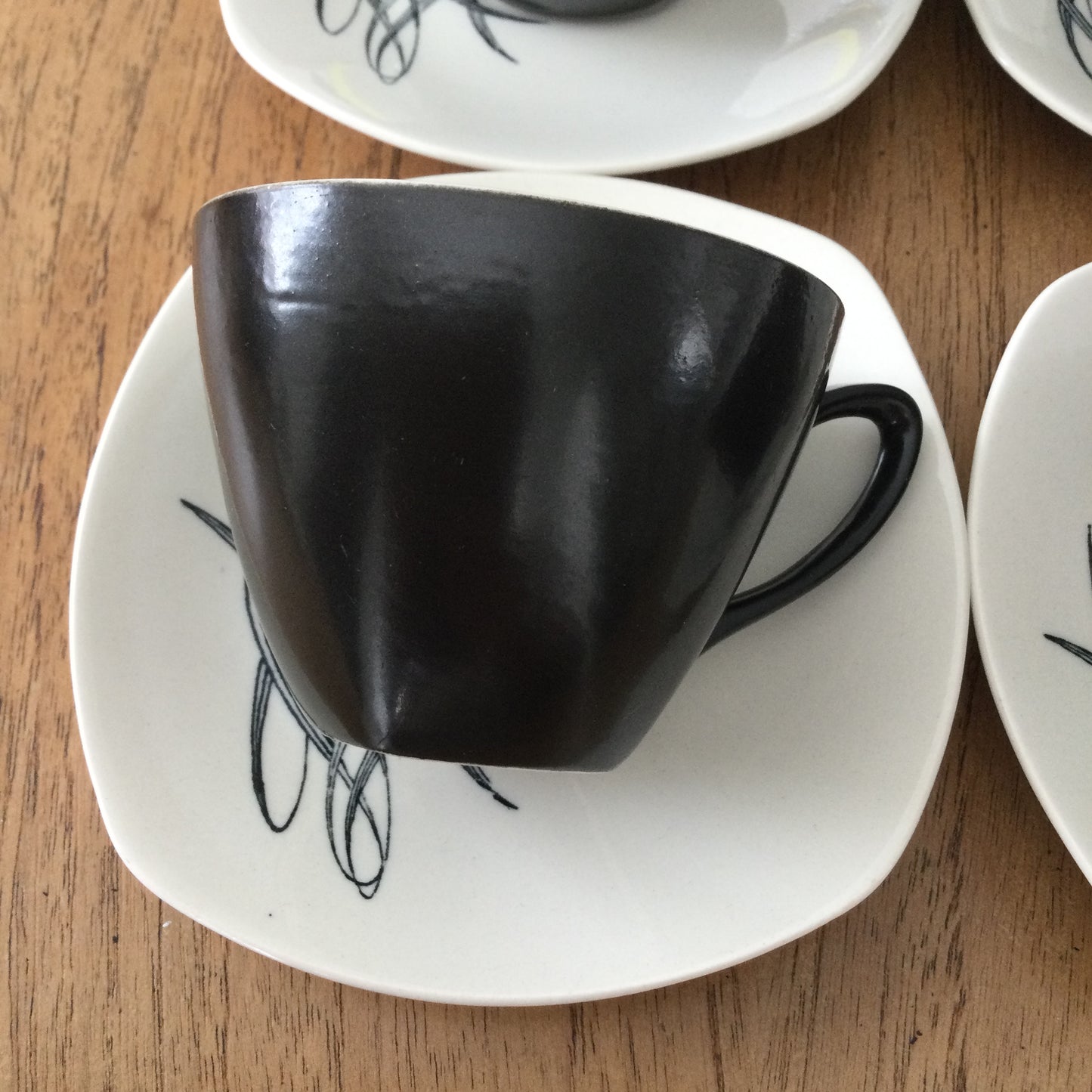 Set of 5 demitasse coffee cups and saucers. Midwinter Bali Hai grasses design by John Russell.