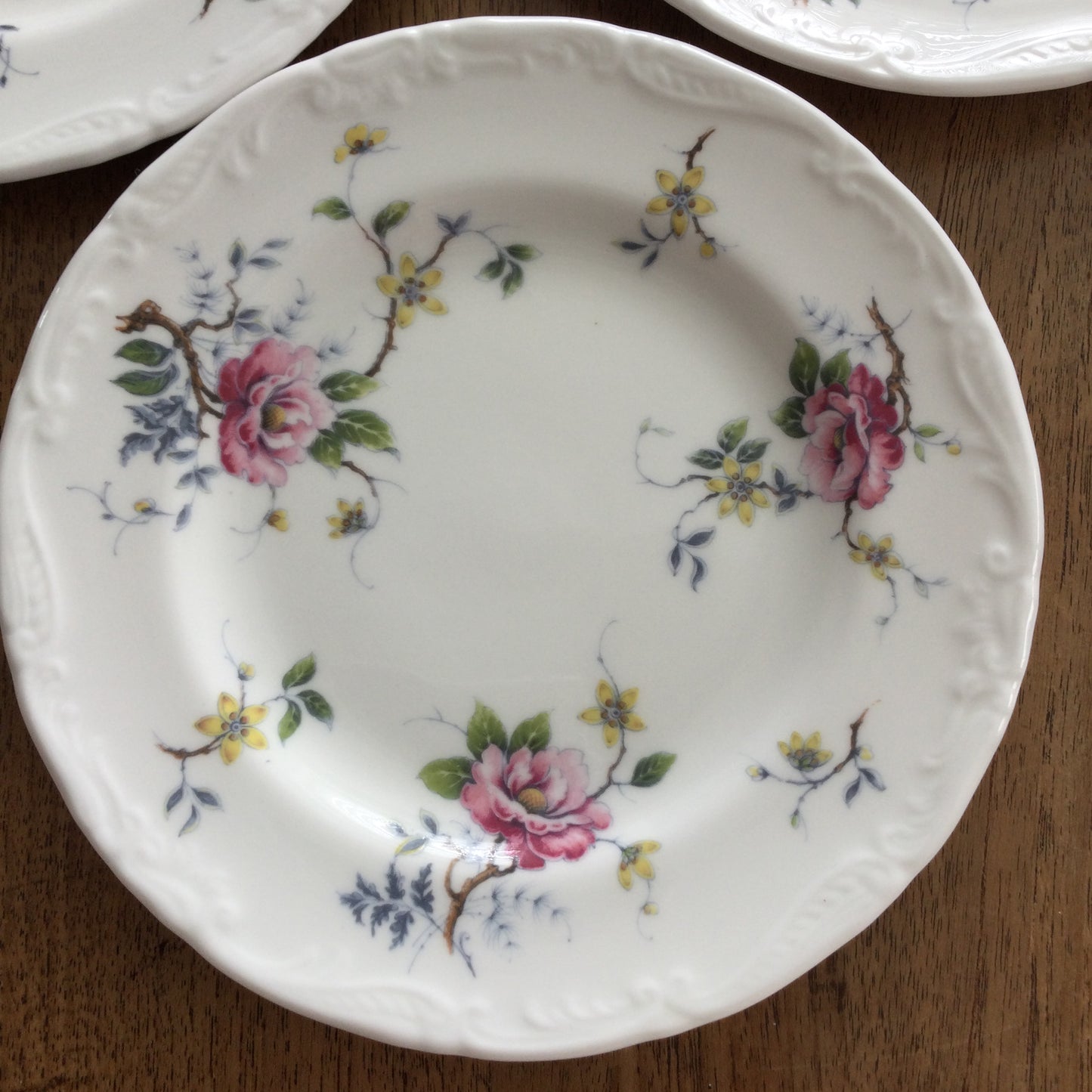 Wedgwood Mayfair Debutante Set Of 6 7" side plates. Fancy edge, pretty floral design. Pink yellow green.