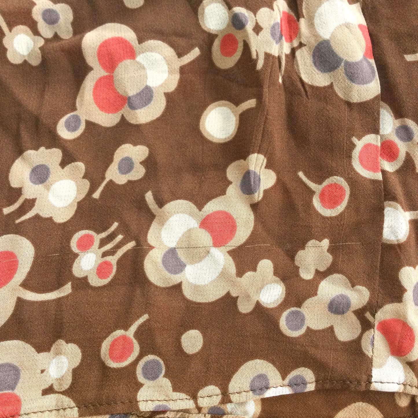 Boden size 16 pretty brown print chiffon top. V-neck, short sleeves. Floaty bold floral print. Elasticated bust.