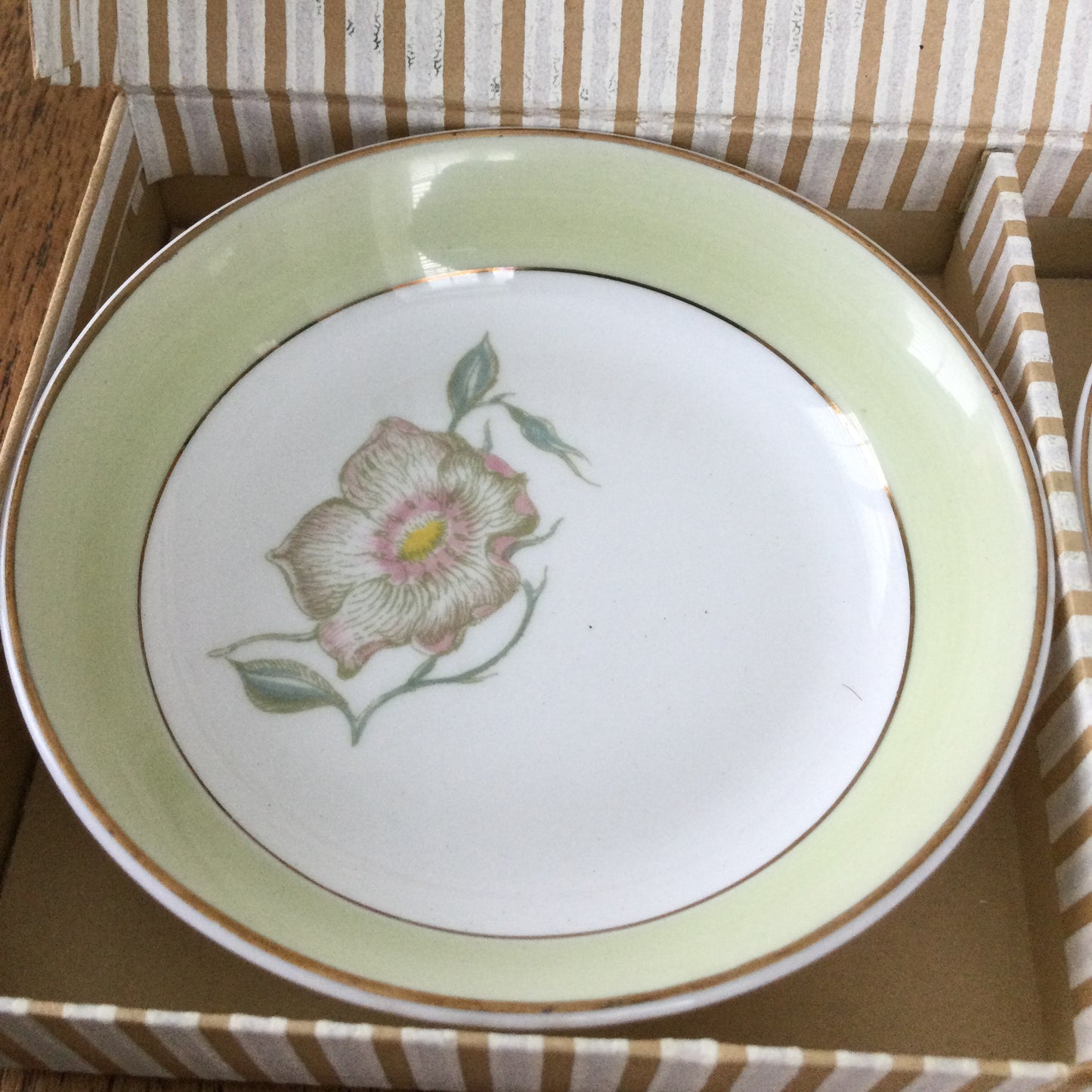 Pair of Susie Cooper for Wedgwood pin dishes in original box. 1950s or 60s. Wild Rose design. Soft green and pink.