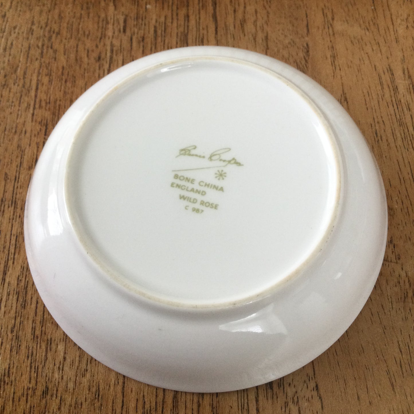 Pair of Susie Cooper for Wedgwood pin dishes in original box. 1950s or 60s. Wild Rose design. Soft green and pink.