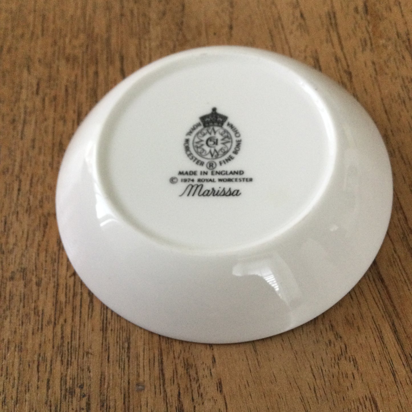 Royal Worcester Marissa pin dish / trinket dish. Round with pink and white rose design. Gold edging.
