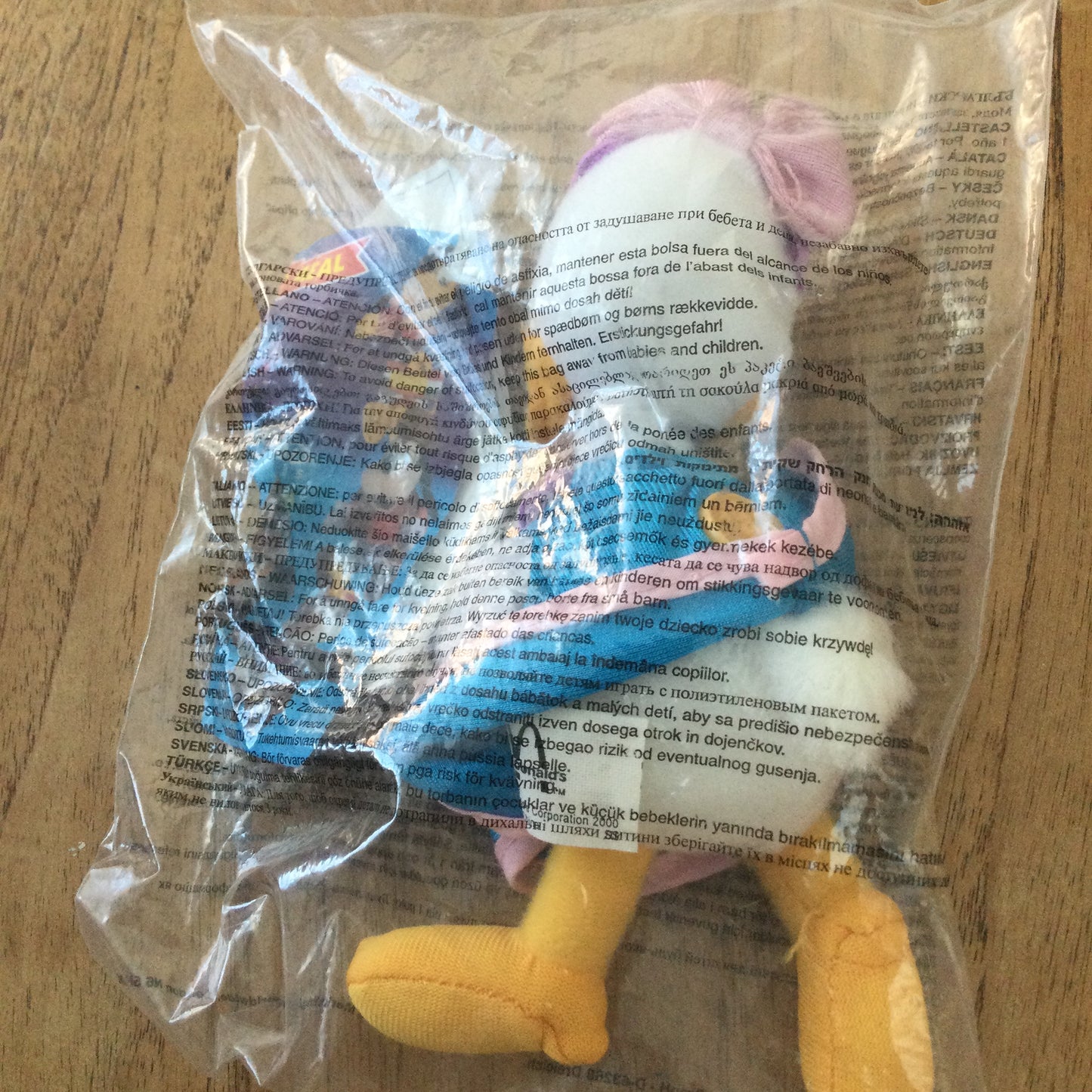 McDonald’s DISNEYLAND PARIS HAPPY MEAL TOY 2000 Daisy Duck in blue dress. In original packaging.