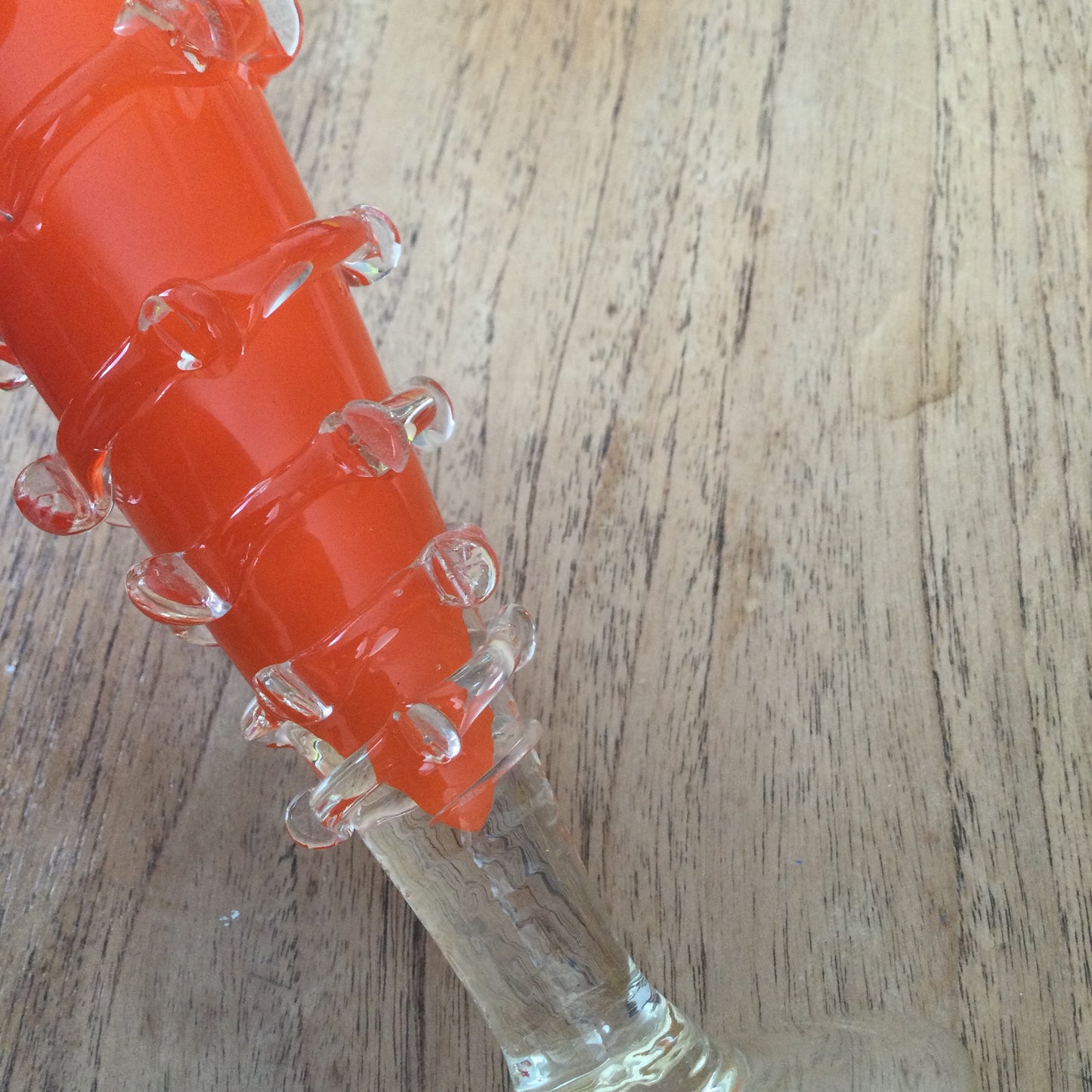 Mid century 1960s orange Murano style vase. Chinese Plum Blossom. Frilly fluted edge. Stemmed bottom.