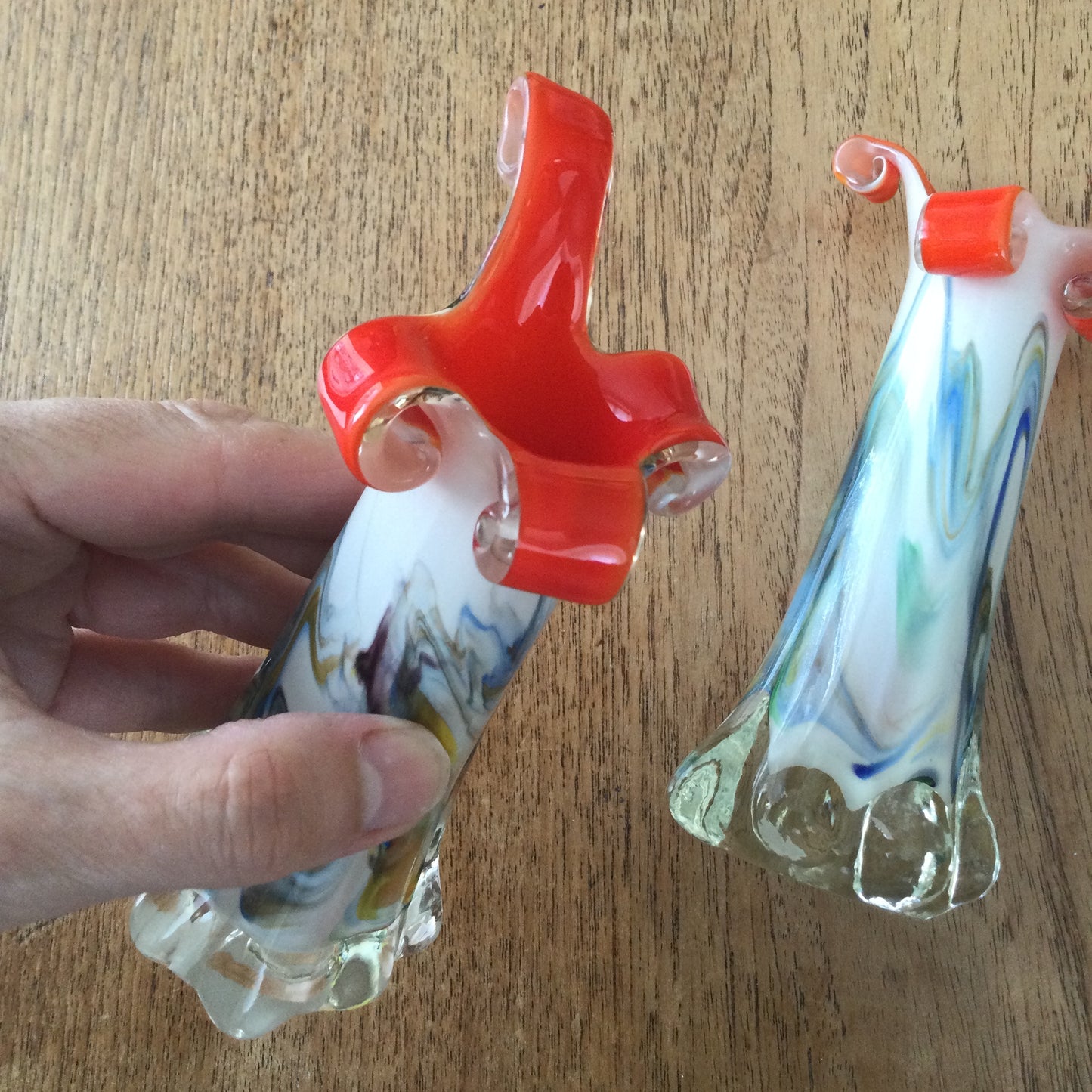 Pair of retro marble effect coloured glass bud vases / candlesticks. Murano style with orange inside.