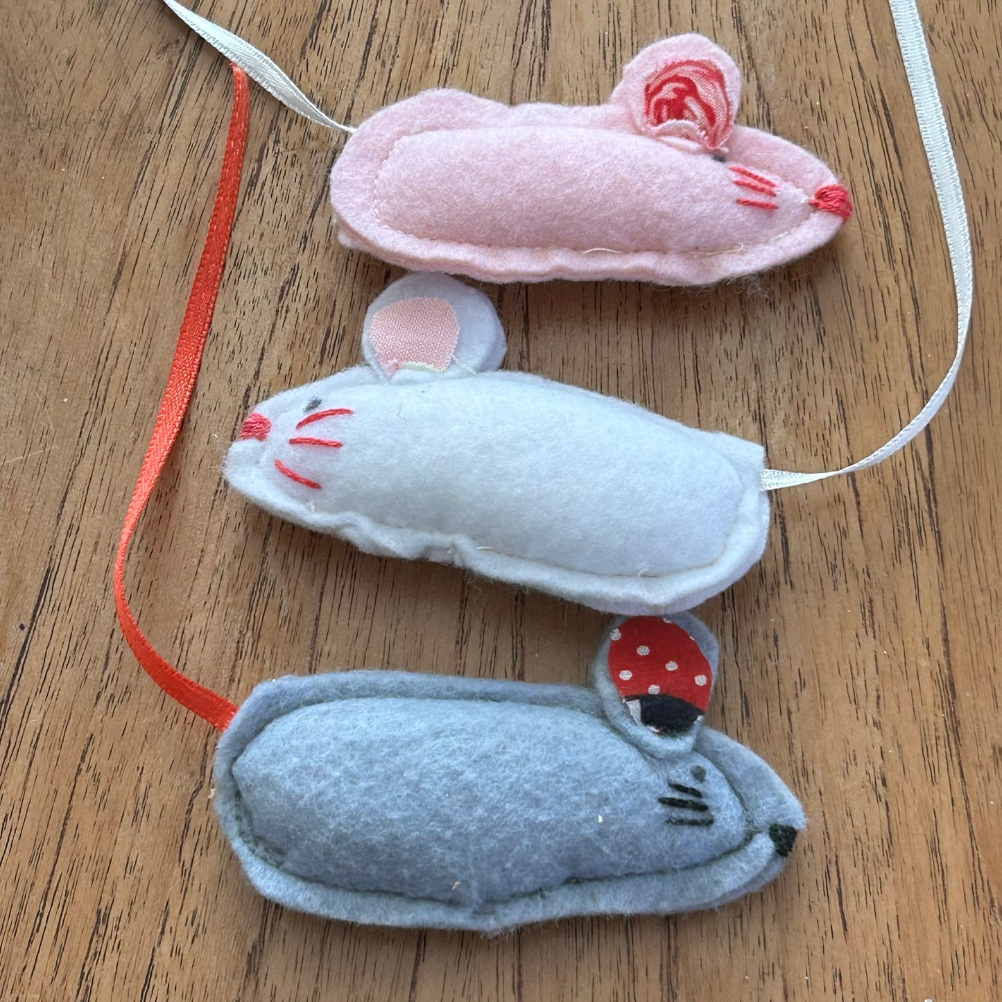 Set of 3 handmade small stuffed felt mice with ribbon tails. Great little toy for kids. Pocket toys.