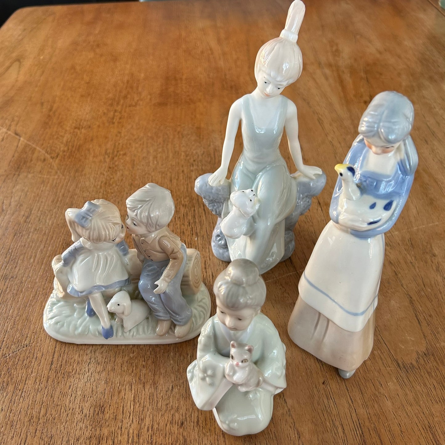 Vintage Girl Figure / Figurine / Ornament - Girl with puppy on lap - 20 cm high - Blue and white Lladro style