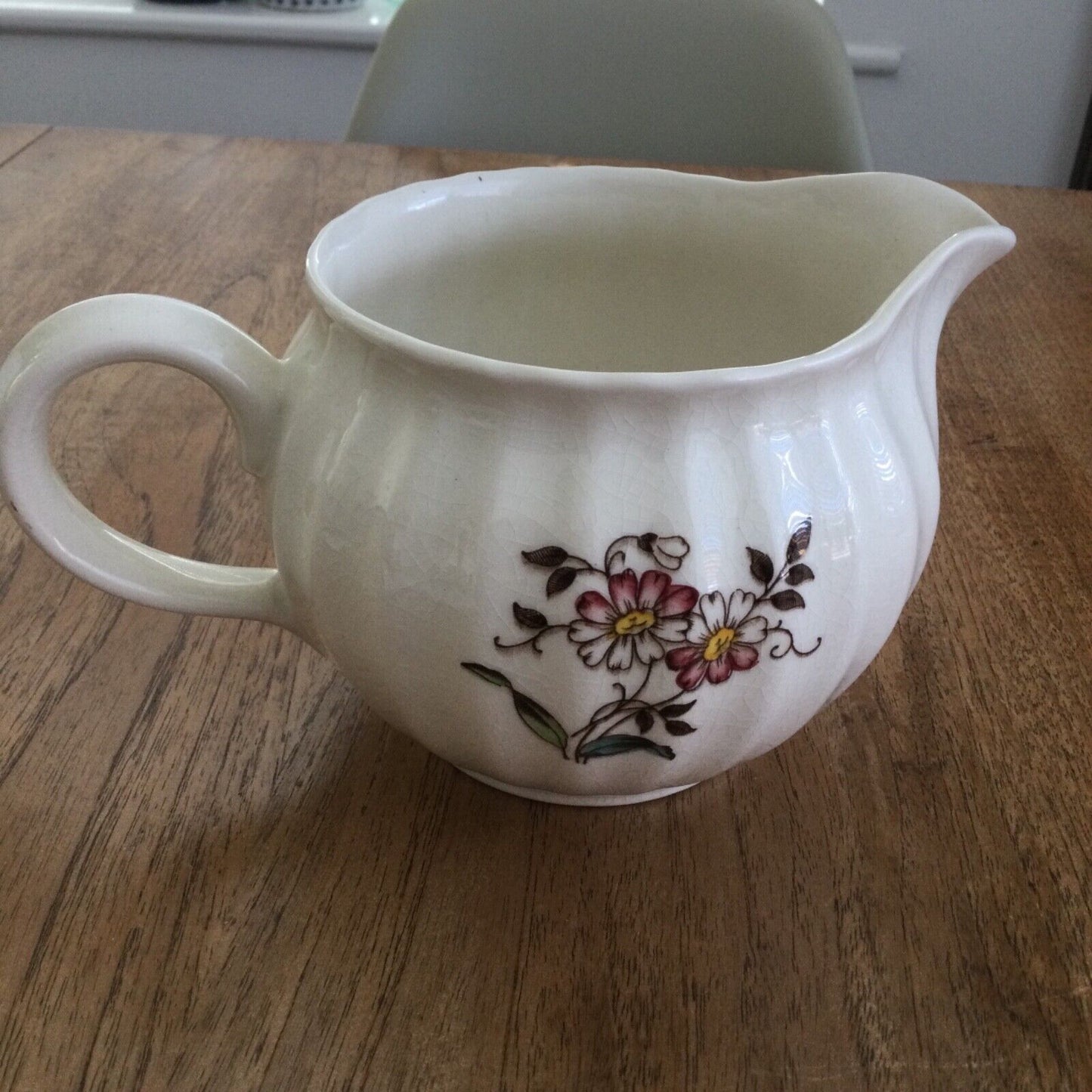 Pretty vintage floral jug Dee Cee cream pink yellow green pastels 12cm Cranbrook. Bulbous round shape.