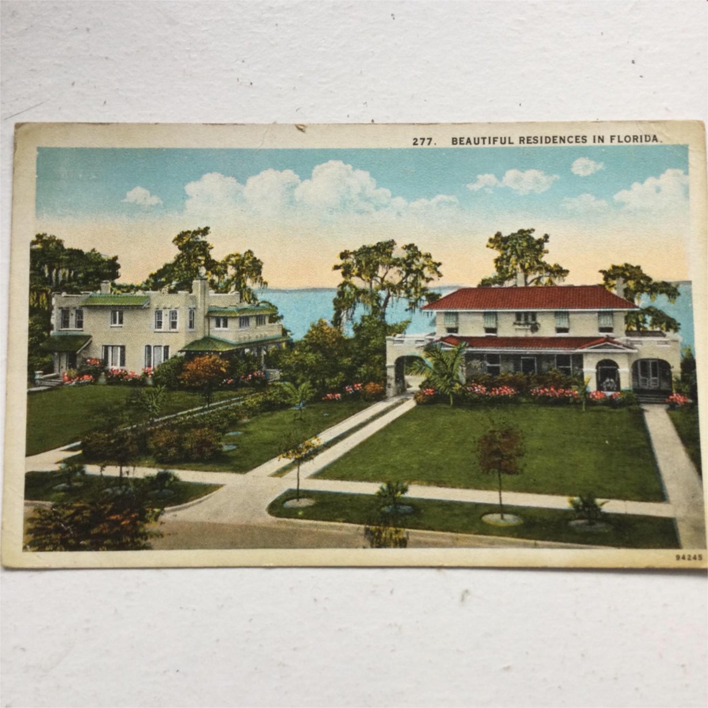 Vintage postcard BEAUTIFUL RESIDENCES IN FLORIDA LOVELY HOUSES LAWNS SEA BEHIND