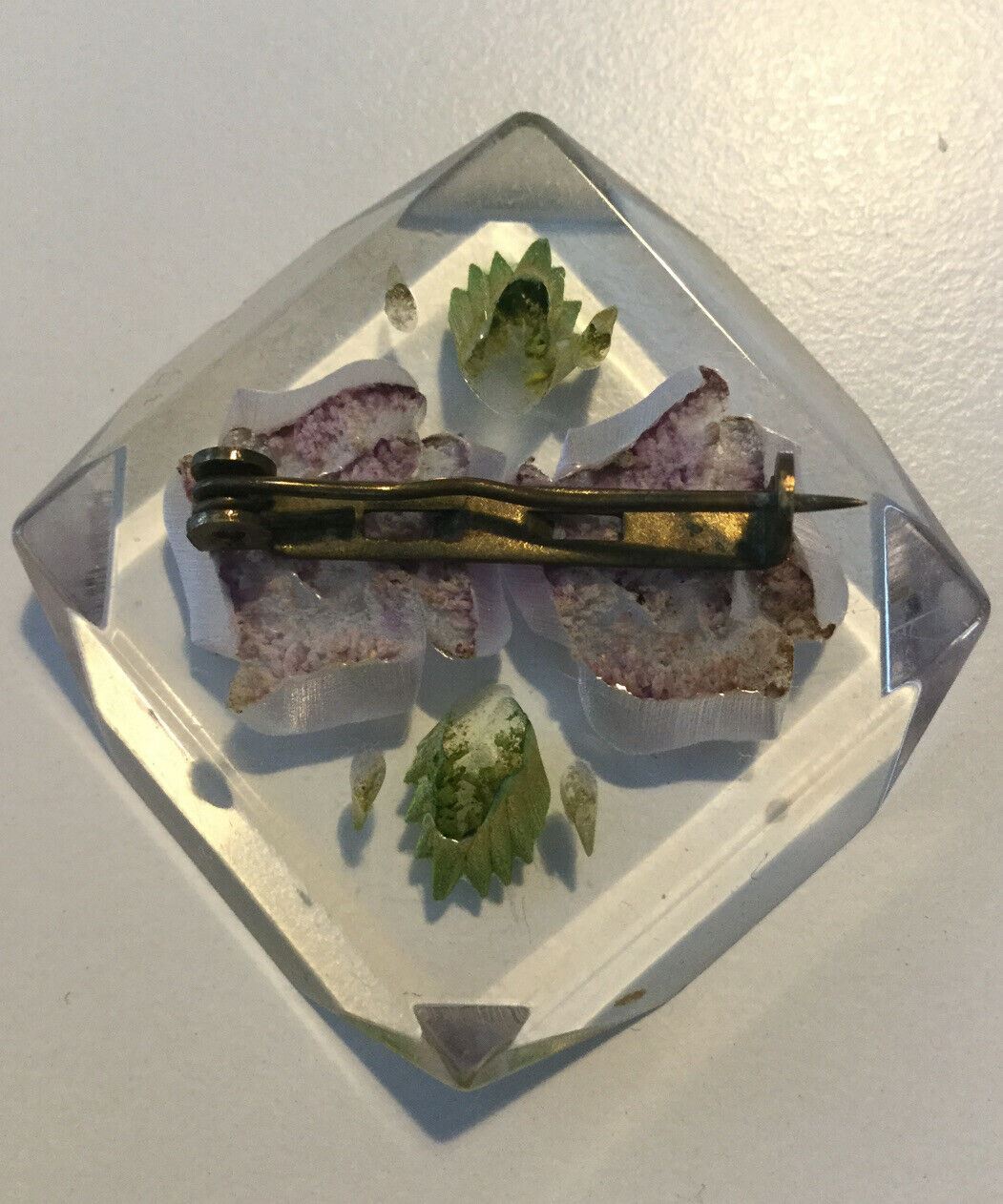 Vintage Plastic Celluloid Reverse Carved Floral Design Brooch. Bevelled Edges.