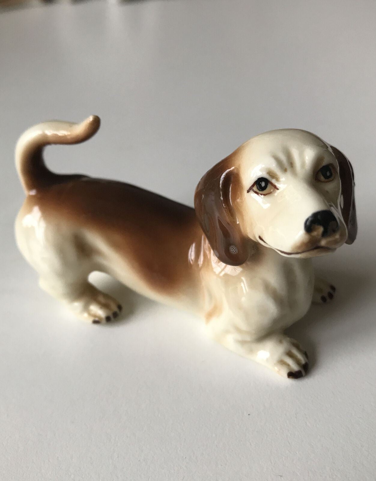 Sausage Dog Dachshund Figurine / Ornament. Playful. Playing. Approx 4.5cm Vintage. Wagging tail.