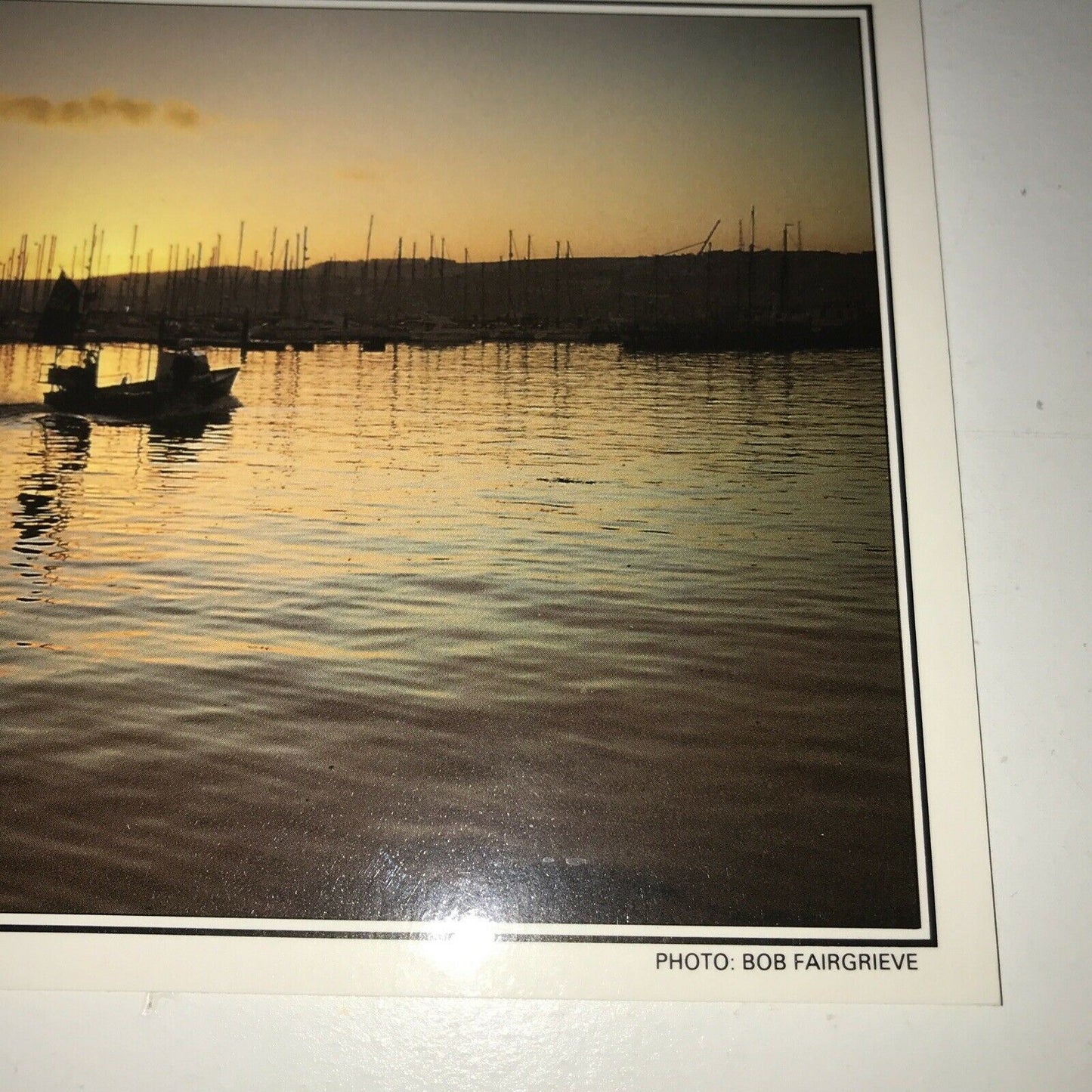 Postcard Plymouth Devon. Putting to Sea. Passing Queen Anne’s Battery. Sunset Sunrise. Unposted