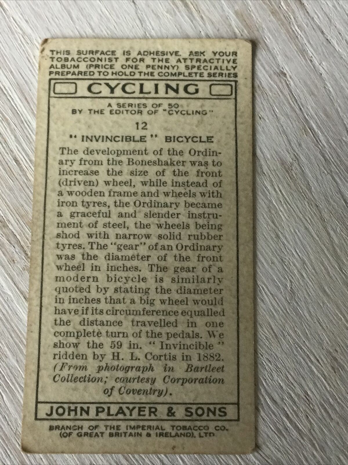 PLAYER'S Cigarette Card. 'Cycling' No. 12 Invincible Bicycle Ordinary Rubber Tyres. 1939.