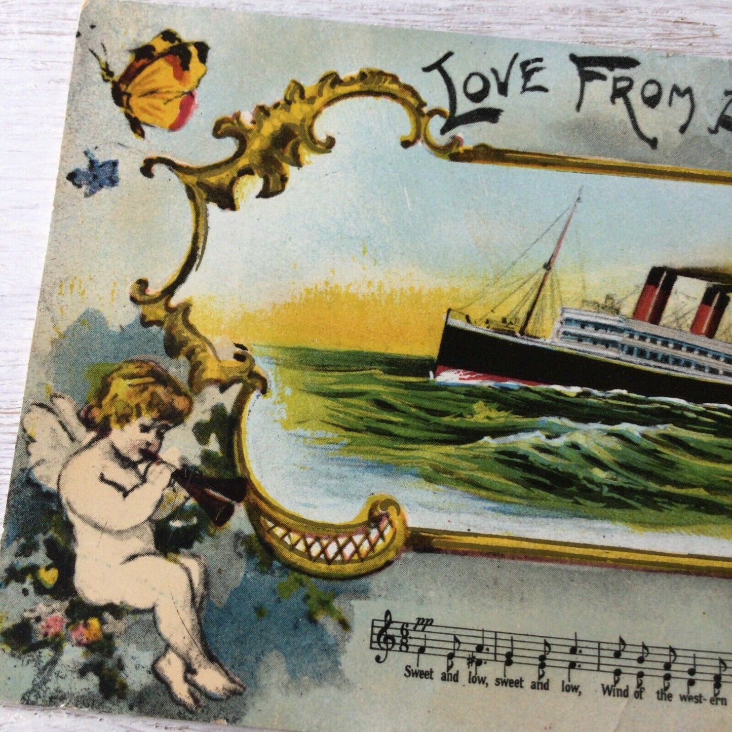 Vintage Postcard Love From Afar. Picture Of Ship Cupids Sweet & Low Wind Of