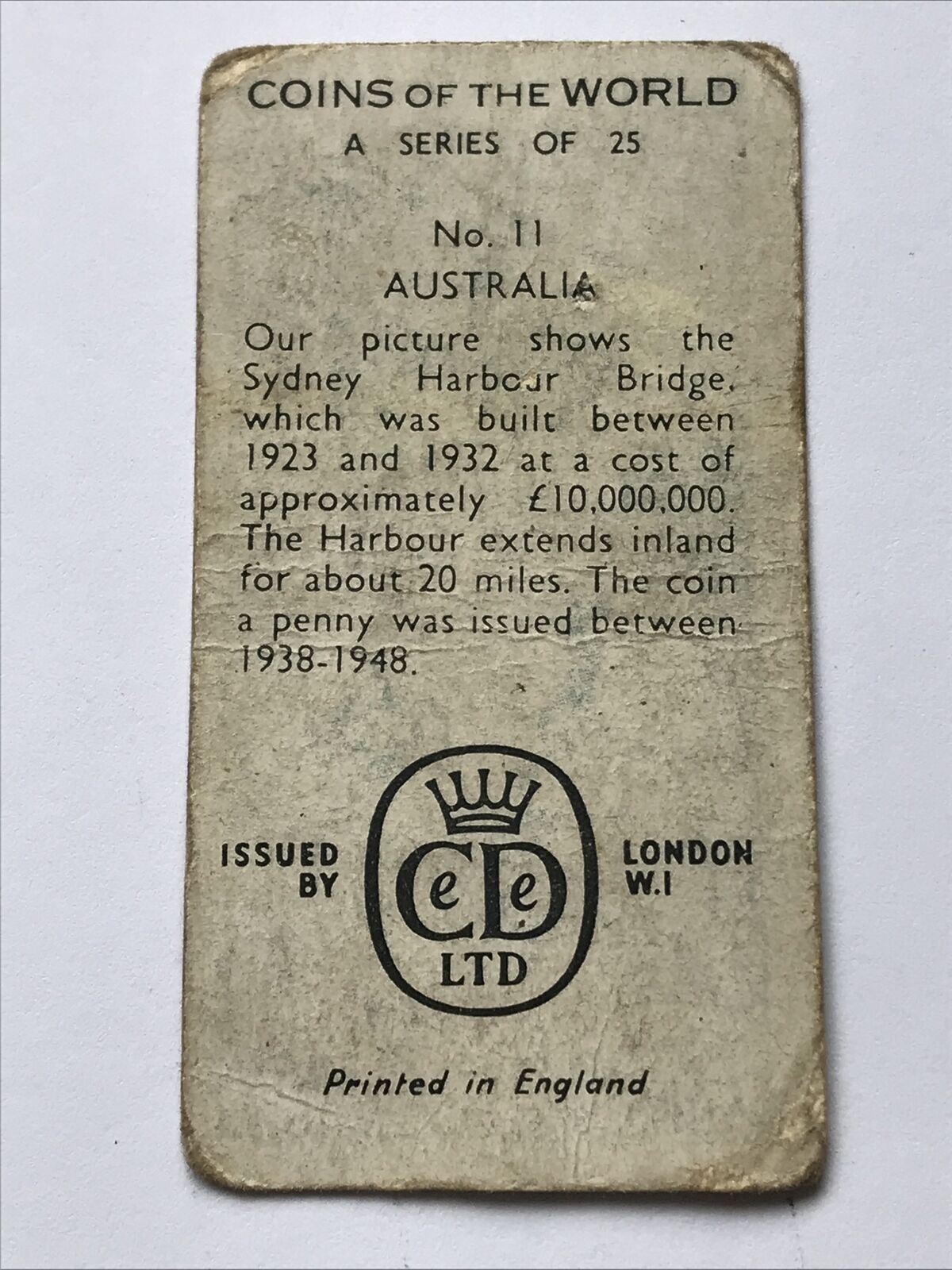 COINS OF THE WORLD AUSTRALIA CD LTD TRADE CARD 11/25 Sydney Harbour Bridge Penny