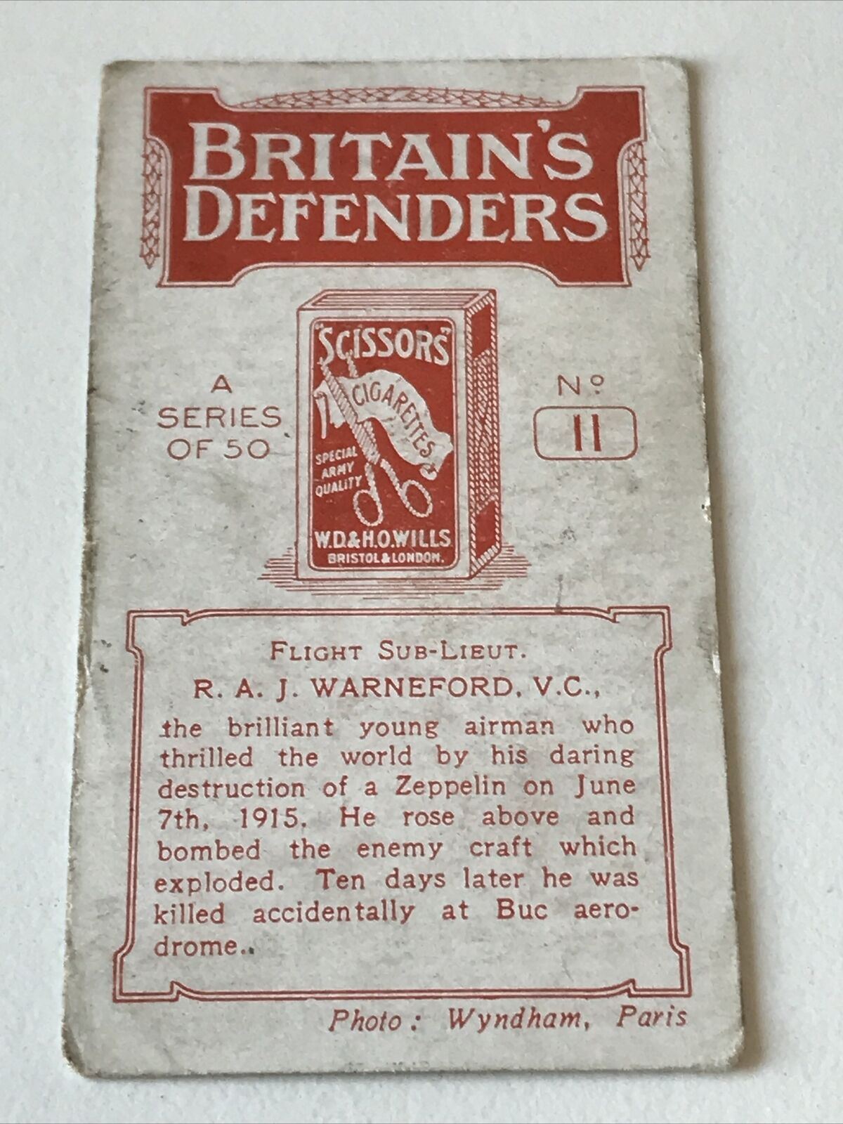 WILLS (SCISSORS) Britains Defenders (RED) #11 FLIGHT SUB-LT RA J WARNEFORD VC