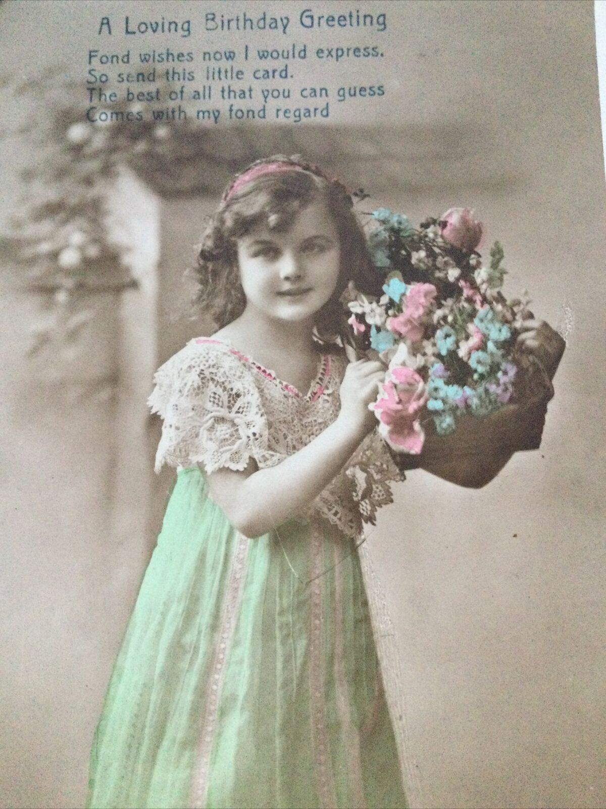 Antique Birthday Greetings Postcard Girl With Basket Of Flowers Ettlingers Hand tinted photo