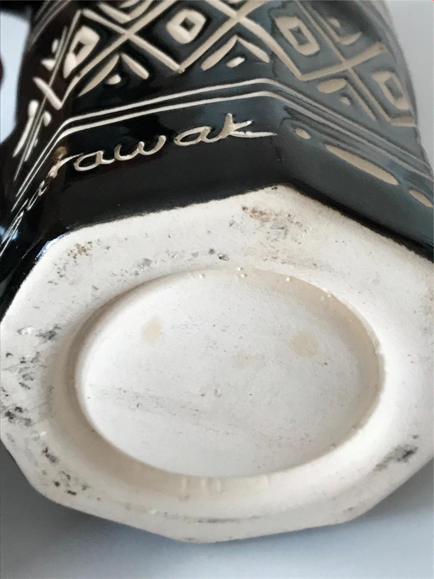 Striking black and cream pottery lidded tankard from Sarawak, Borneo, Malaysia.