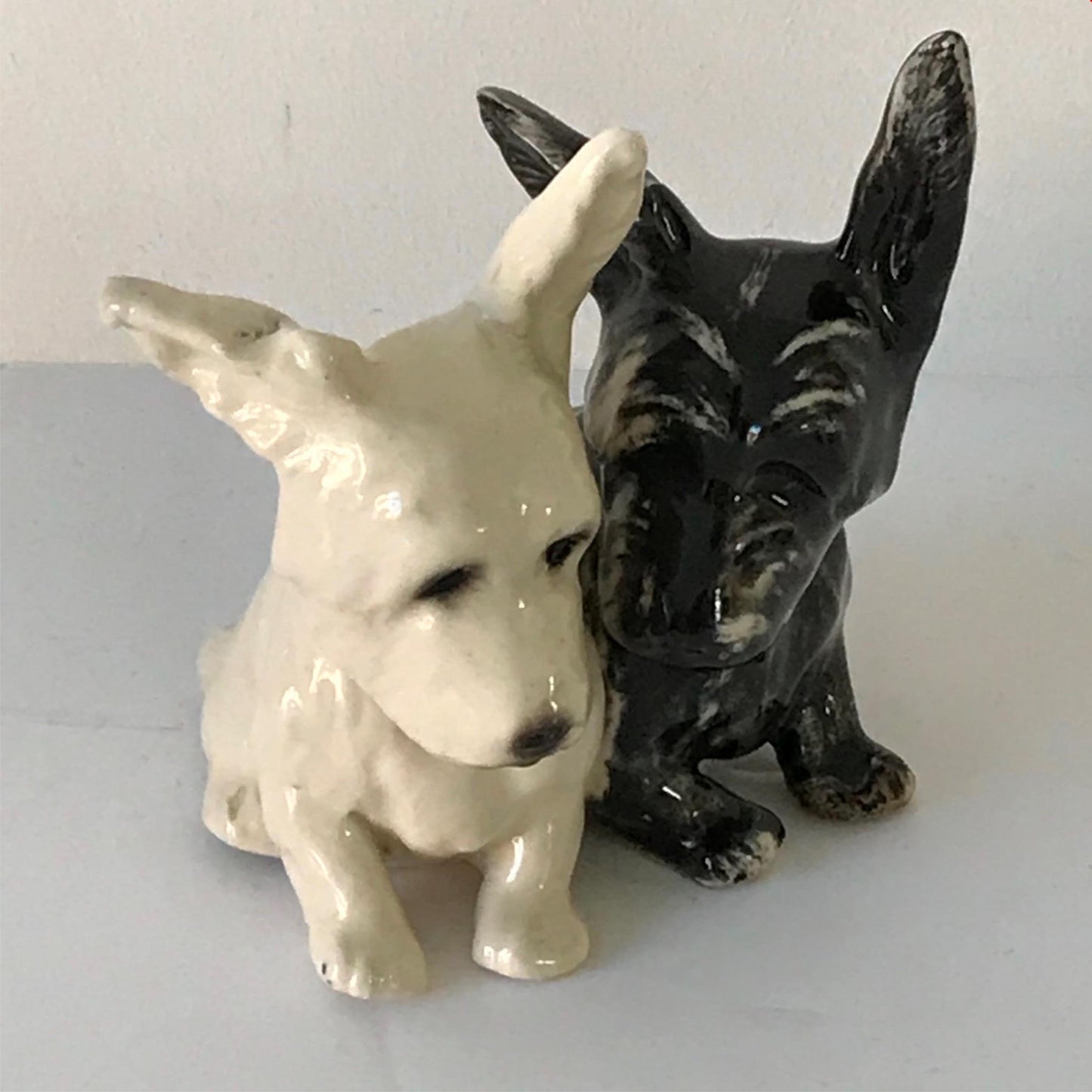 Cute vintage scottie / westie dog ornament - pair of small terriers black white pointed long ears
