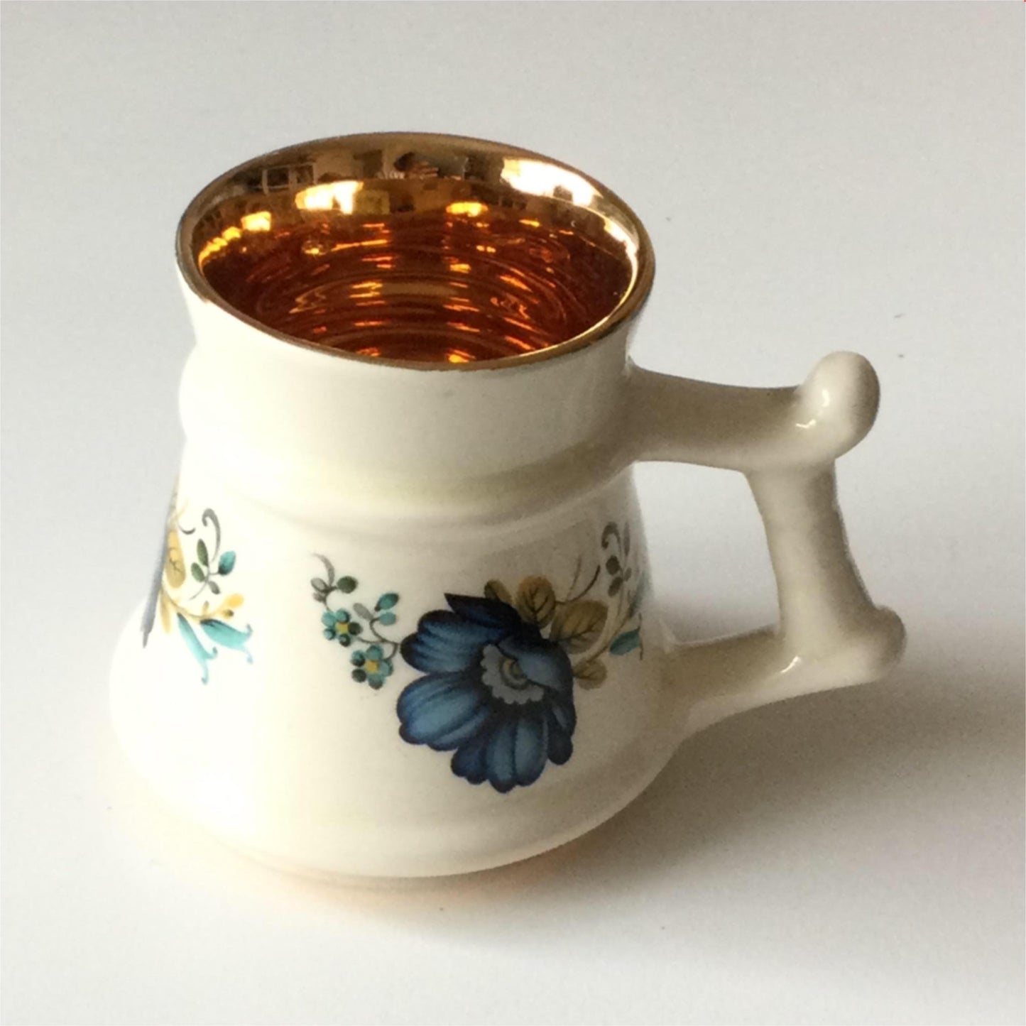 PRINKNASH POTTERY Gloucester small blue floral tankard with bright gilt inside