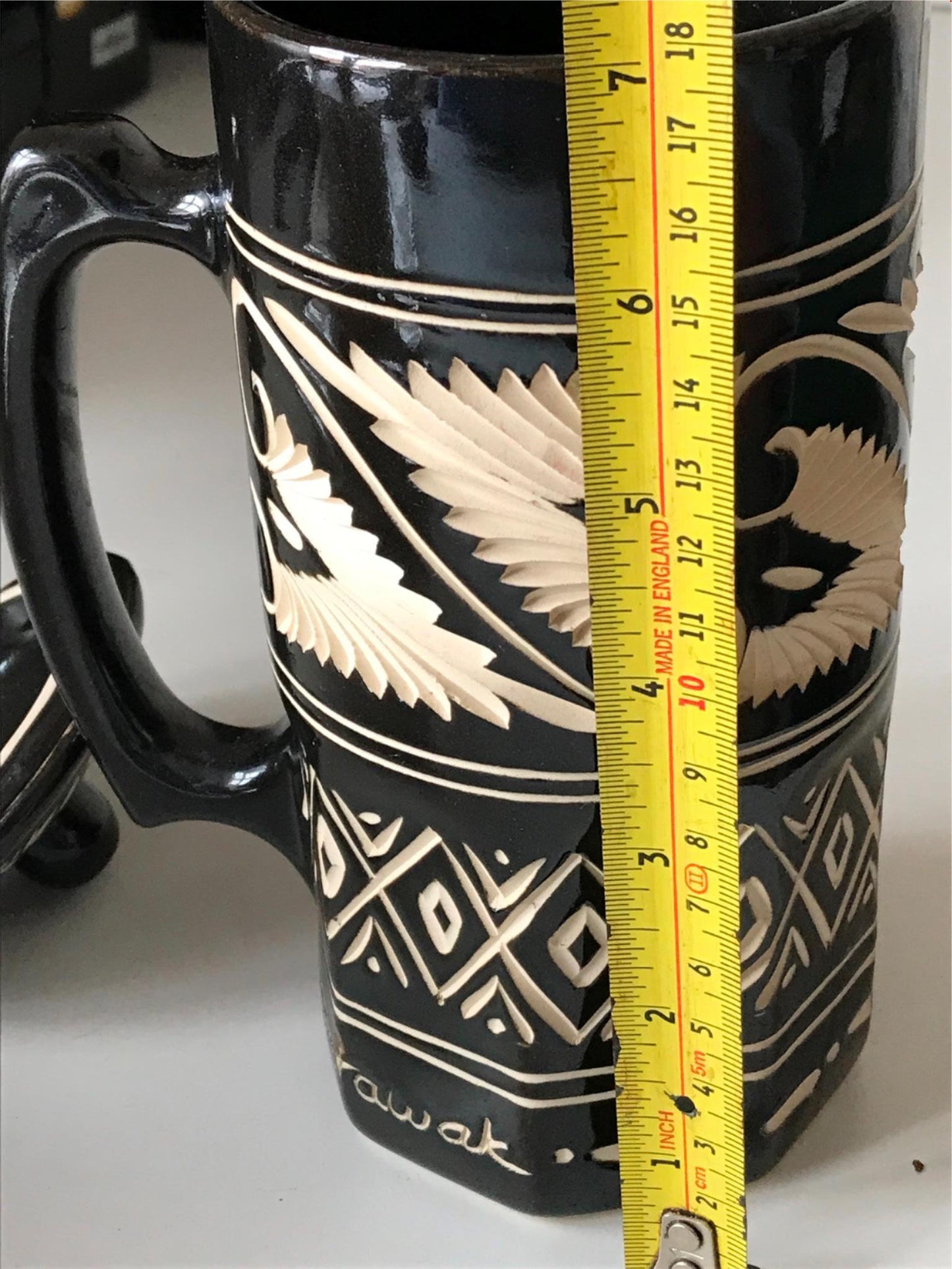 Striking black and cream pottery lidded tankard from Sarawak, Borneo, Malaysia.