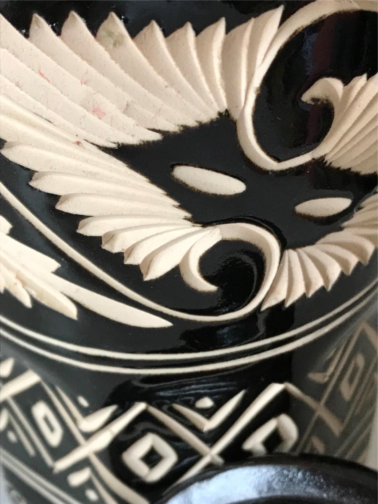 Striking black and cream pottery lidded tankard from Sarawak, Borneo, Malaysia.