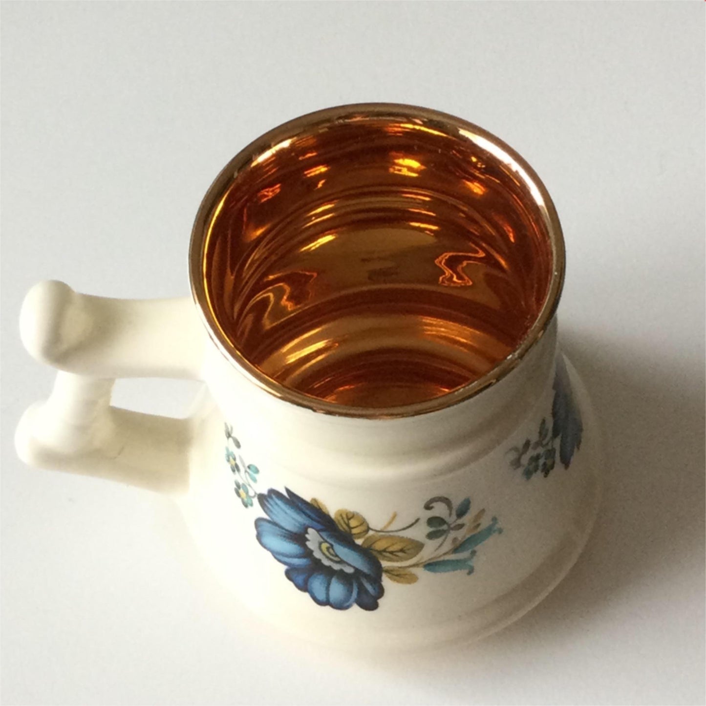 PRINKNASH POTTERY Gloucester small blue floral tankard with bright gilt inside