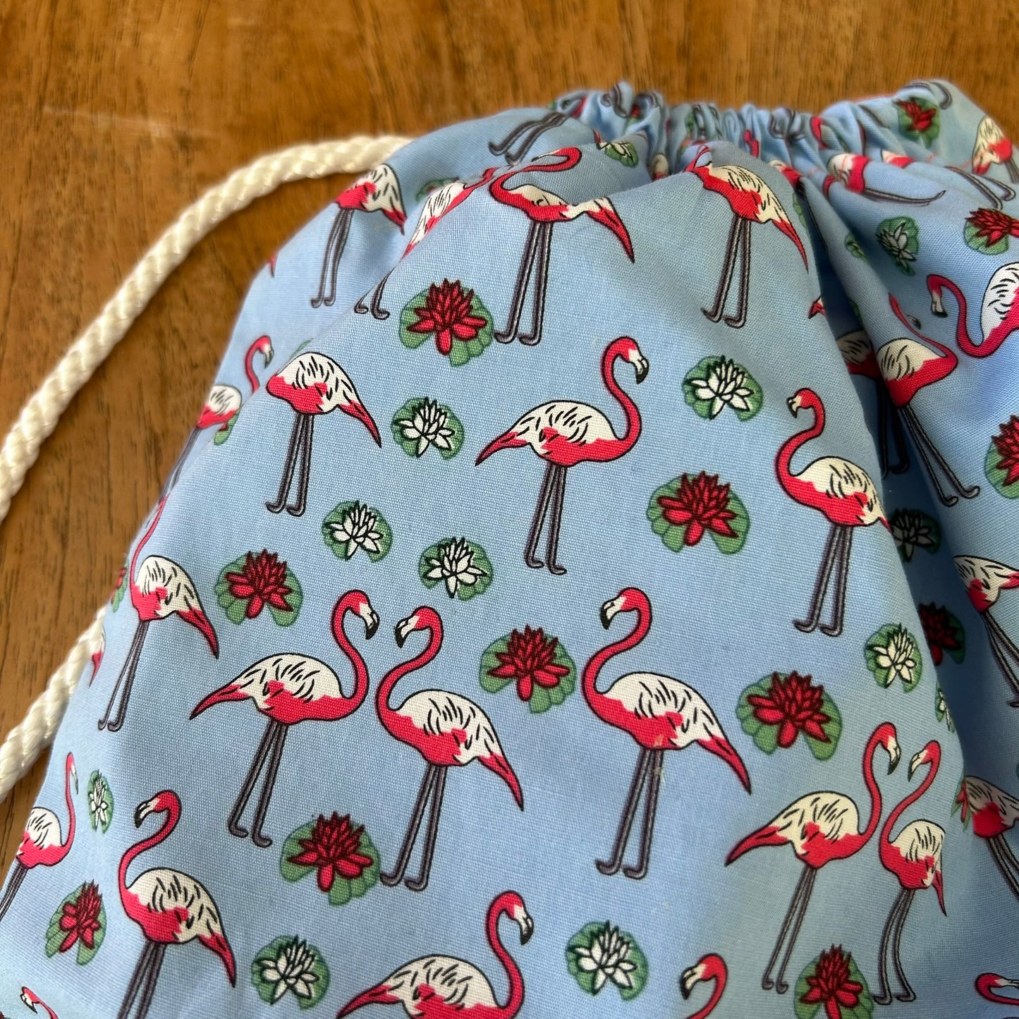 Beautiful Quality Hand Made Drawstring Pump Bag/ Tidy Bag. Pink Flamingo Design On Blue Background.